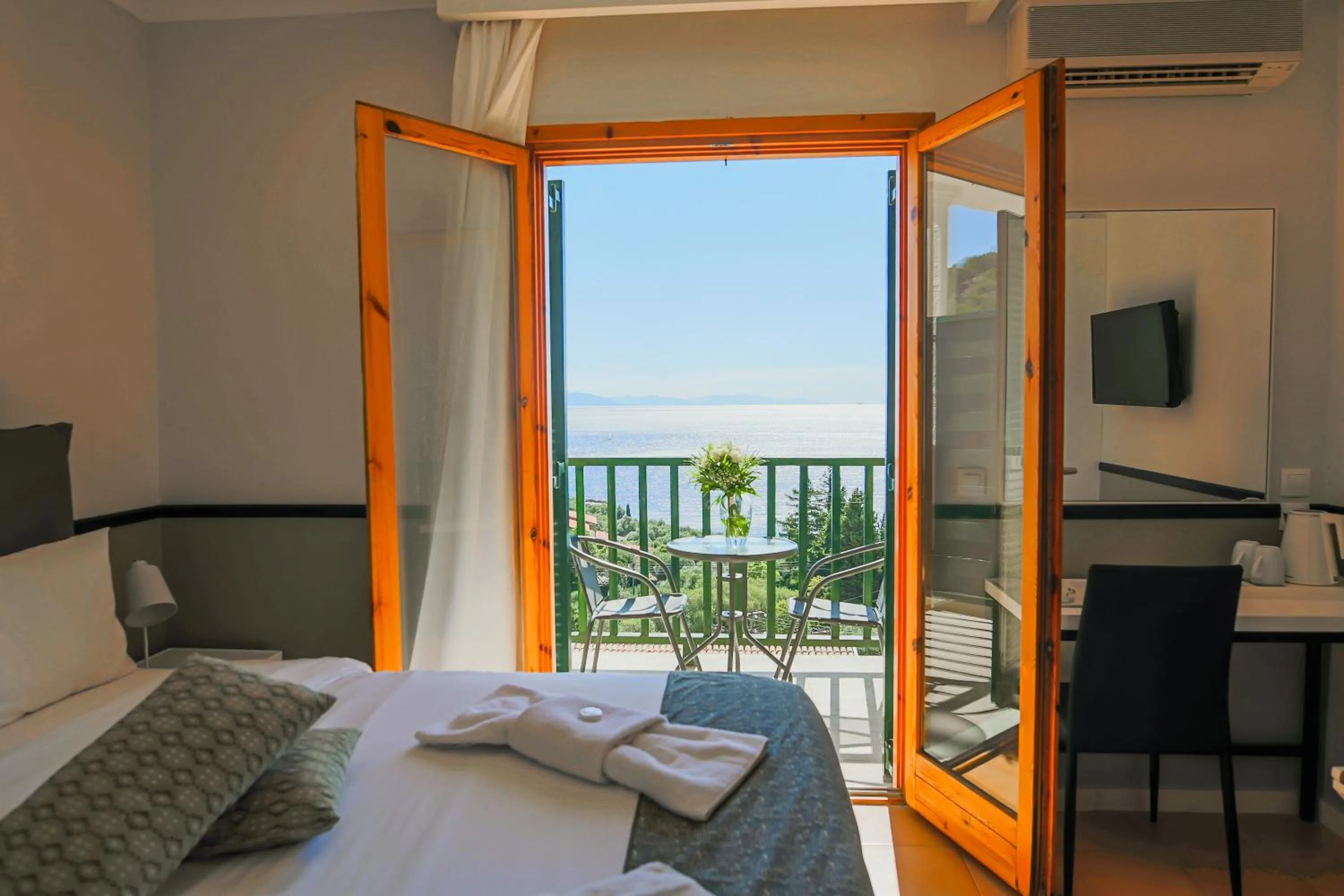 Bed in Corfu Aquamarine Hotel