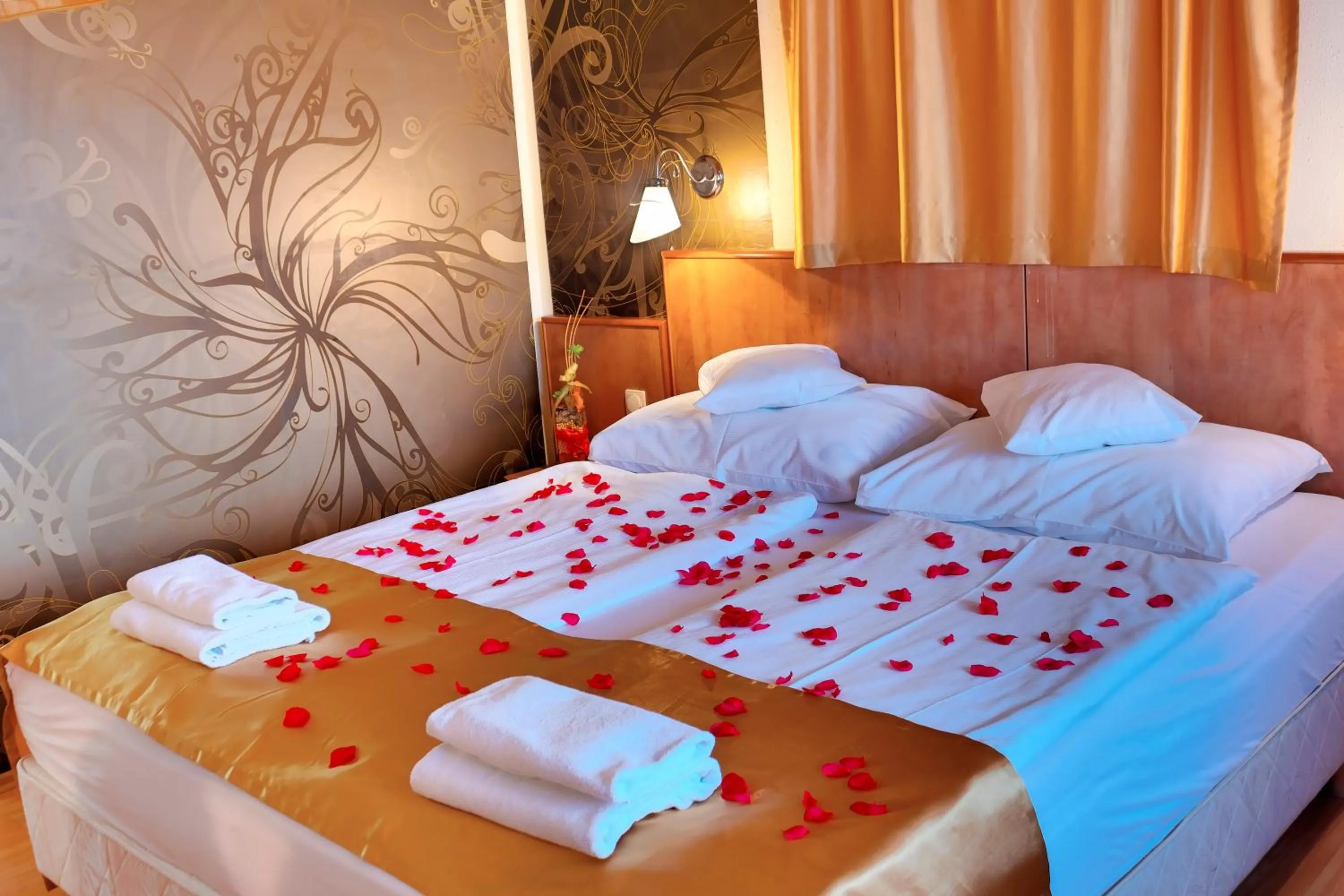Bed in Aqua Therm Hotel