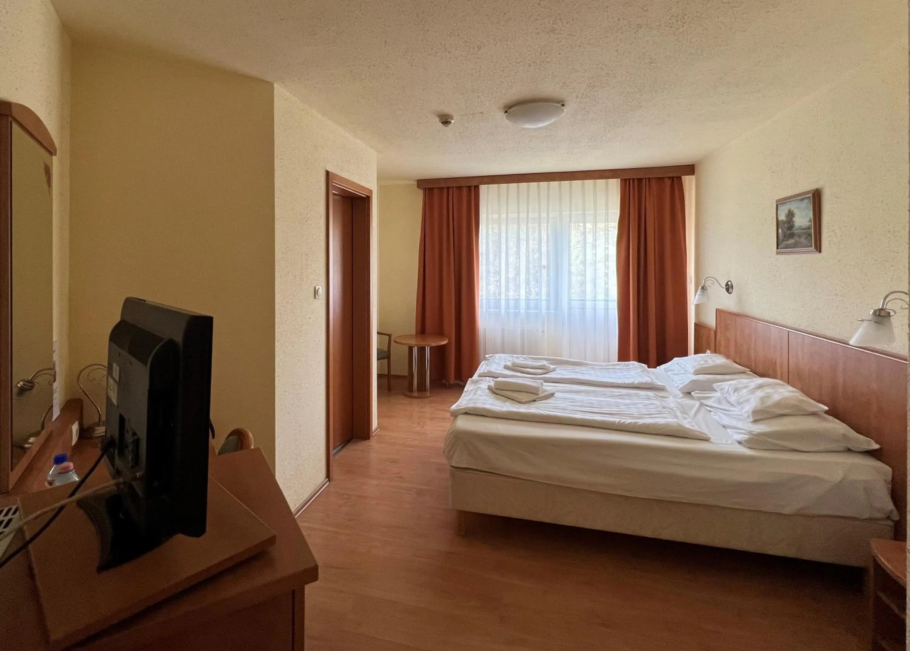 Bed in Aqua Therm Hotel