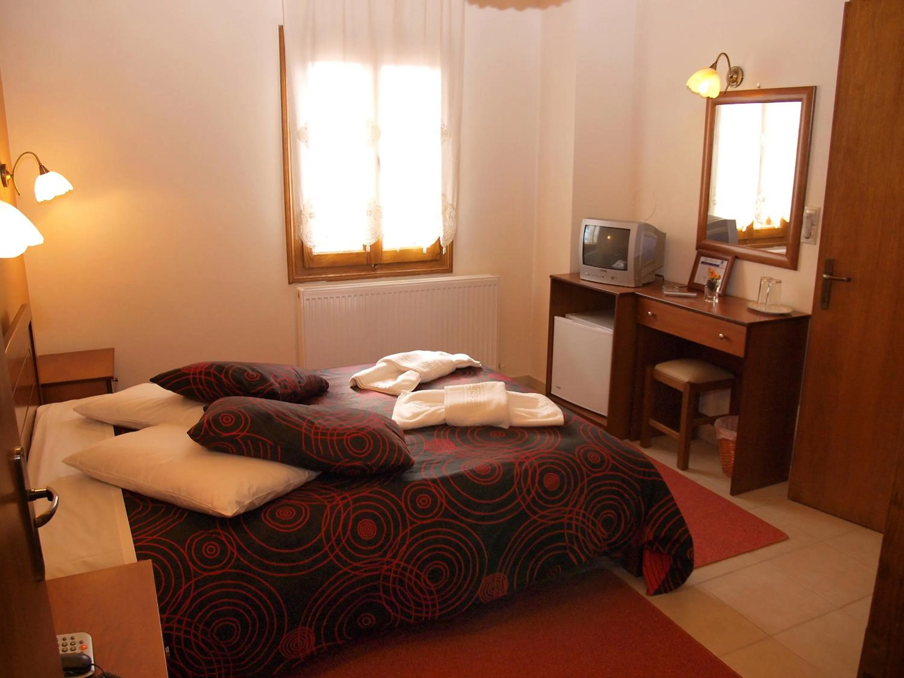 Bed in Hotel Ilianna