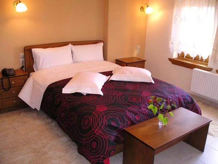 Bed in Hotel Ilianna