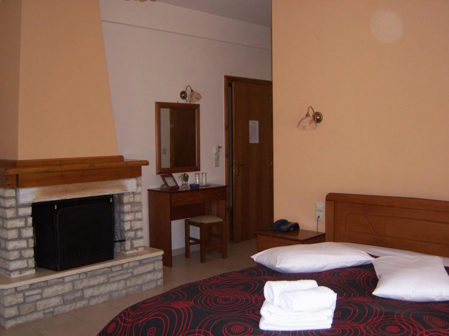 Bed in Hotel Ilianna