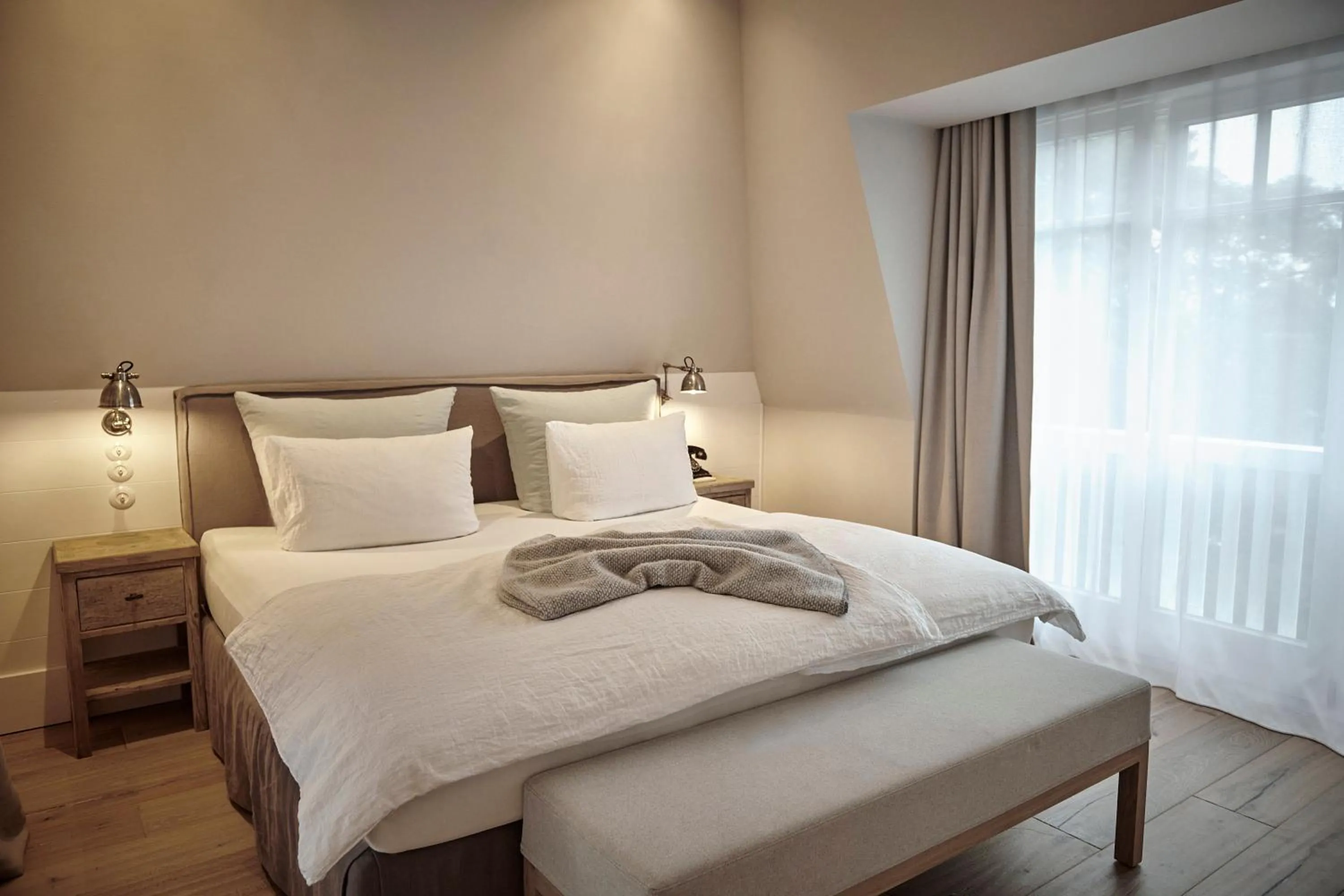 Bed in The Cozy Hotel & Lofts Timmendorfer Strand