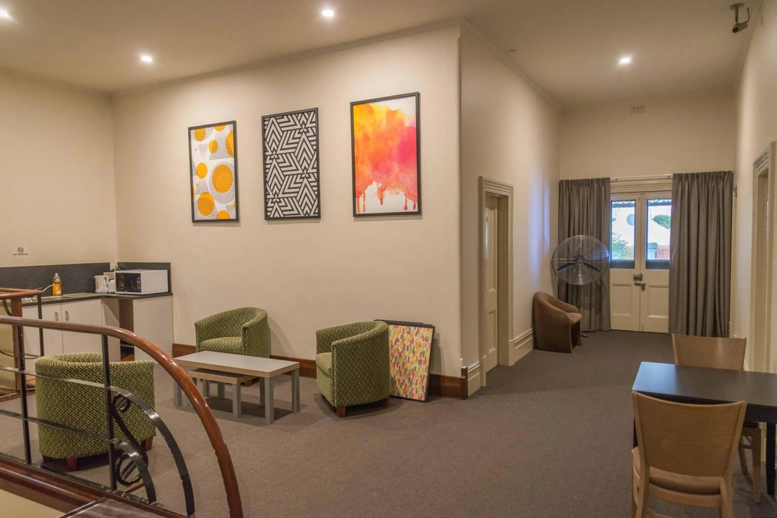 Communal lounge/ TV room in The Mile End Hotel