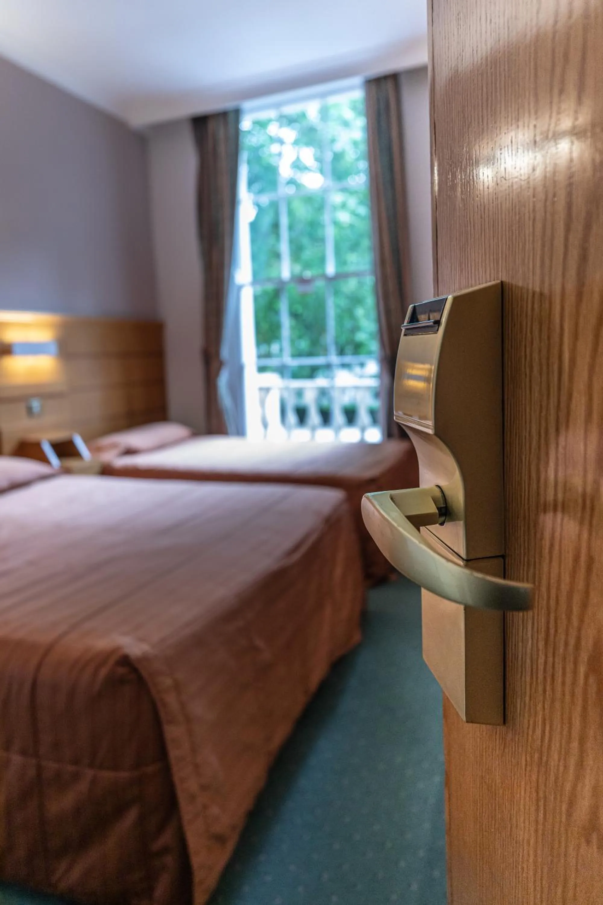 Bed in The Nayland Hotel