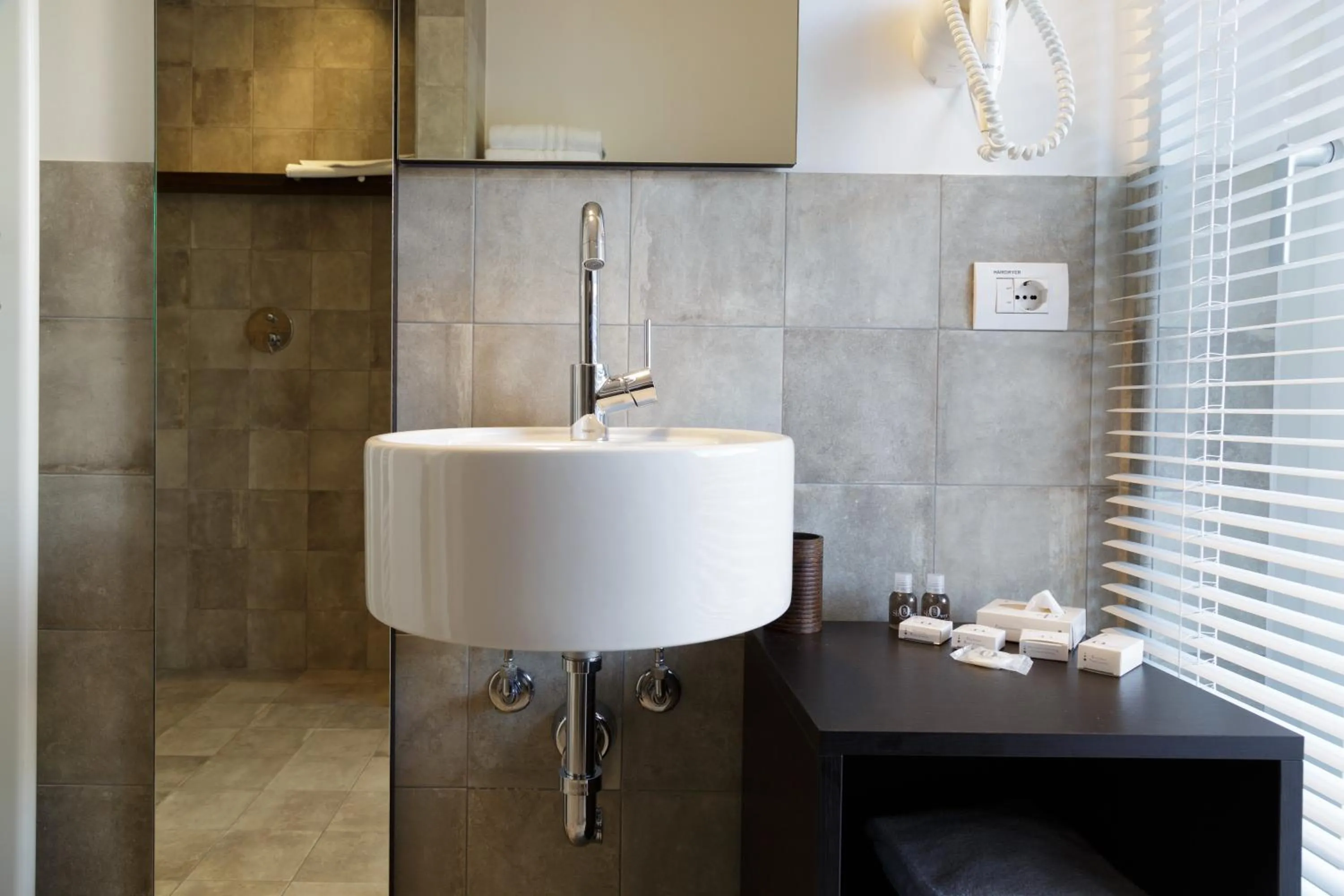 Bathroom in Nenè-Il Vicolo Apartments and Rooms