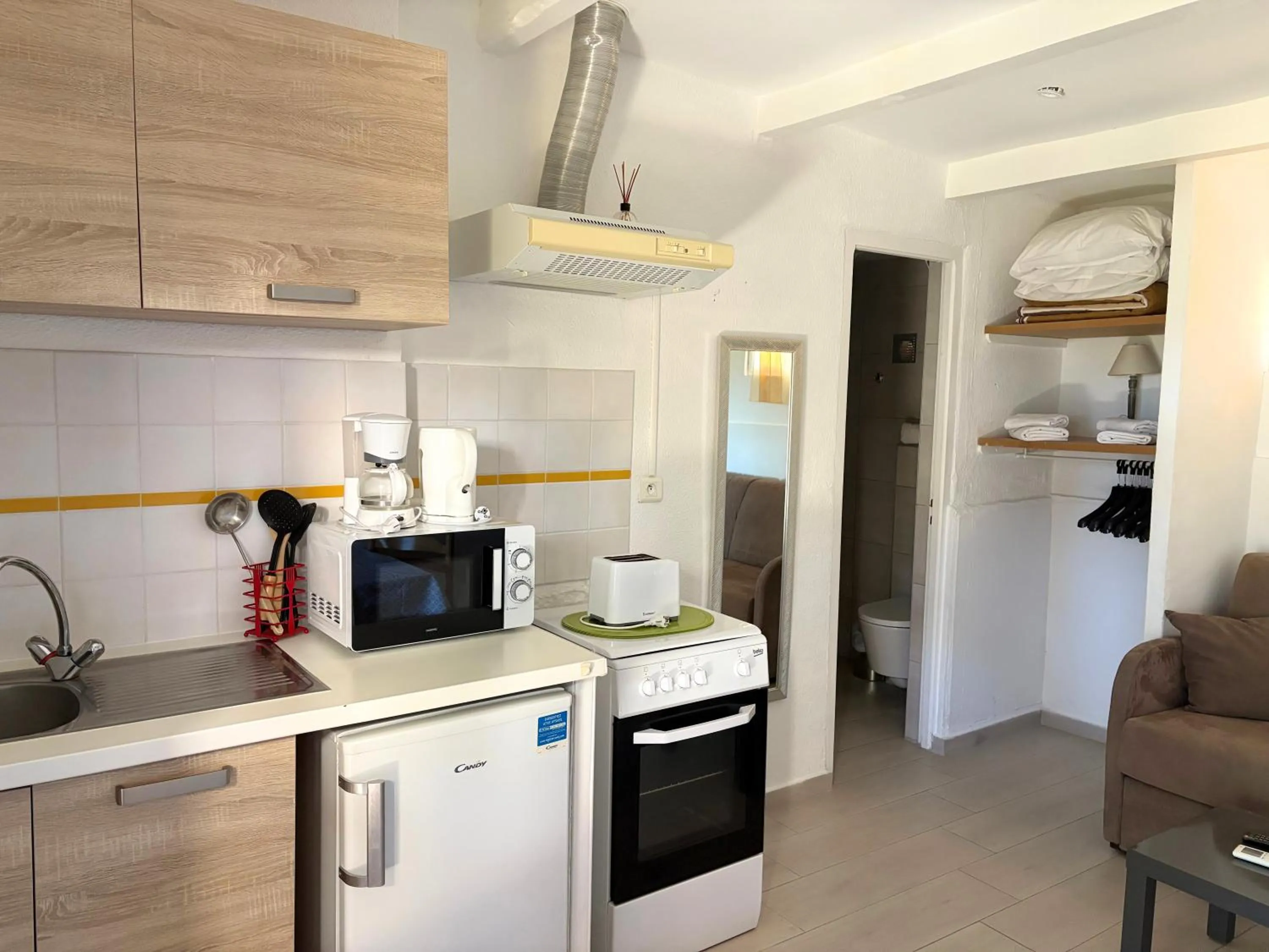 Kitchen or kitchenette in Bungalows Du Maquis