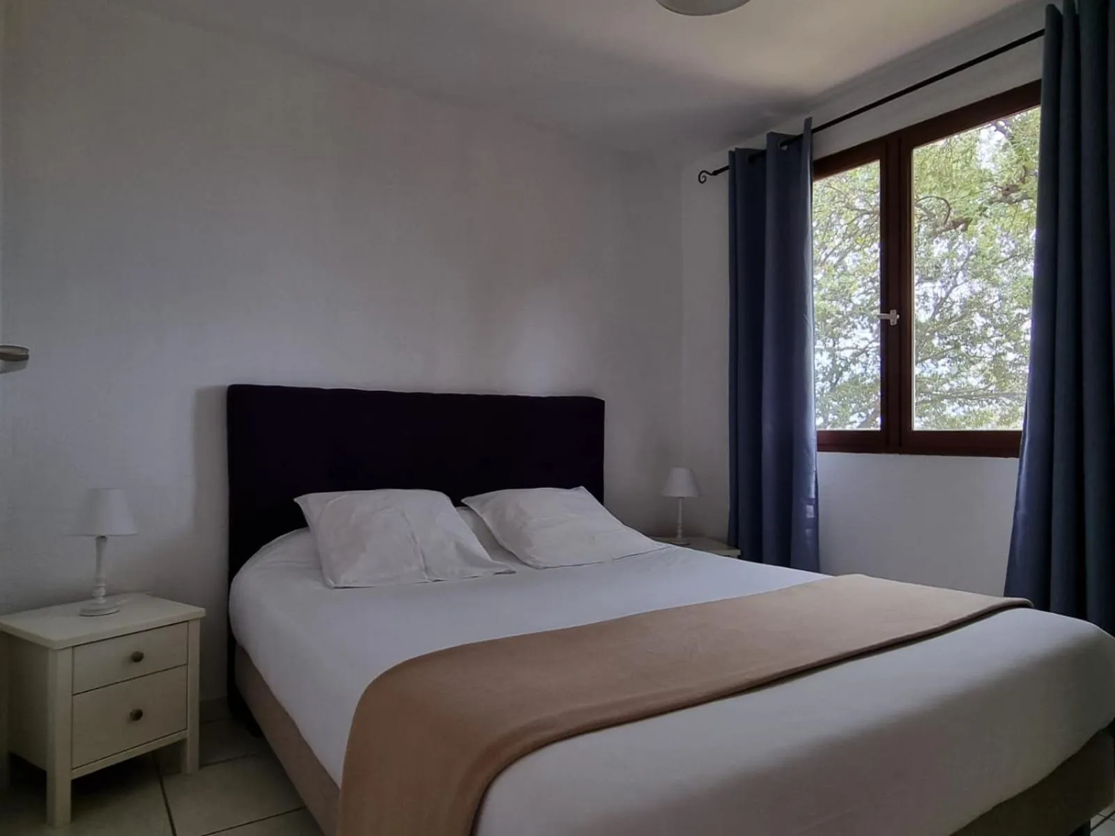 Bed in Bungalows Du Maquis