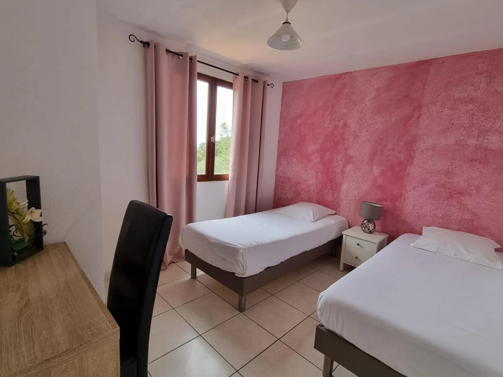 Bed in Bungalows Du Maquis