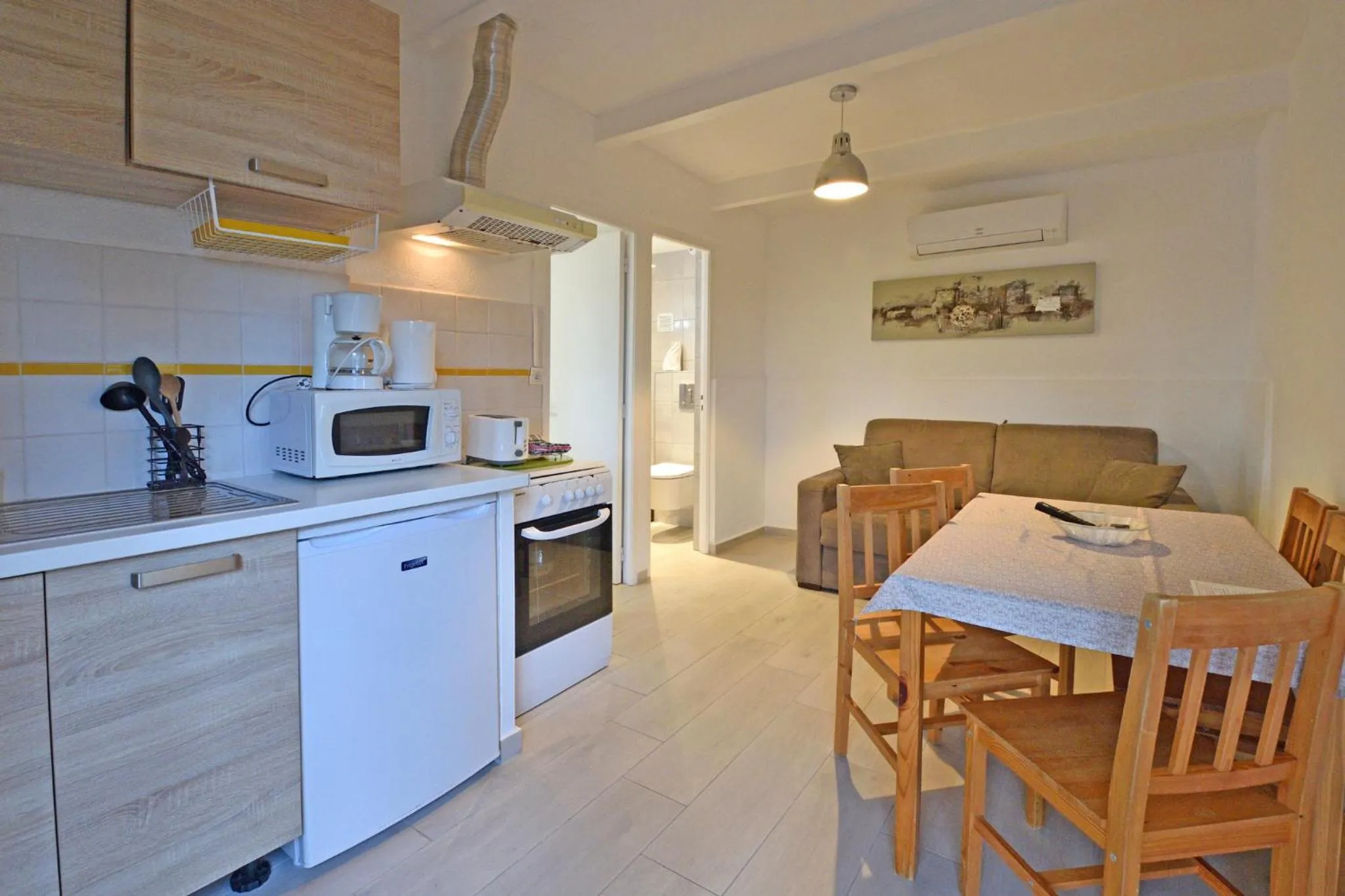 Kitchen or kitchenette in Bungalows Du Maquis