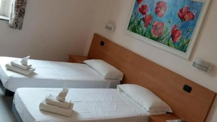 Bed in Palma Residences In Rome