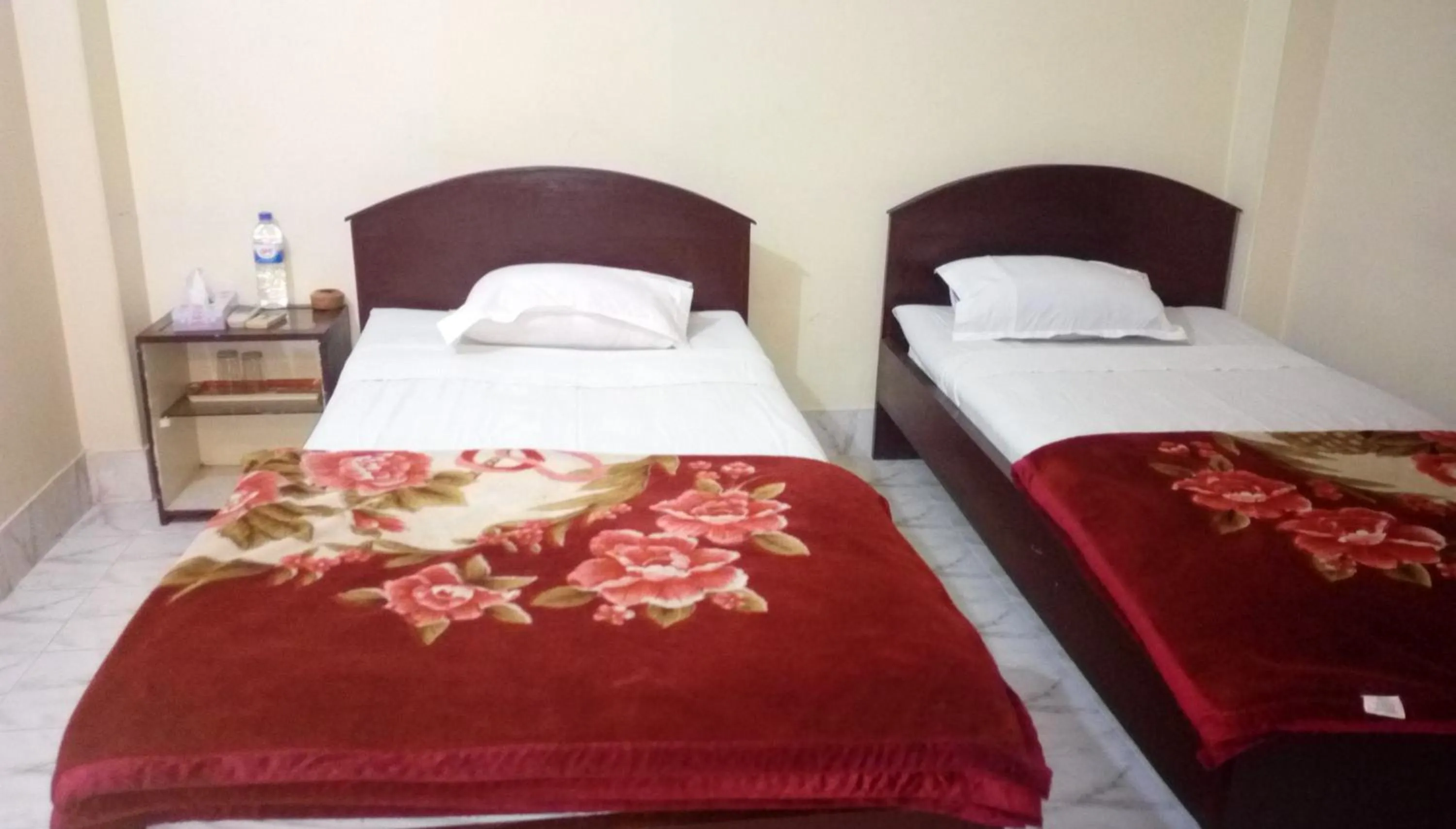 Bed in Hotel Plaza