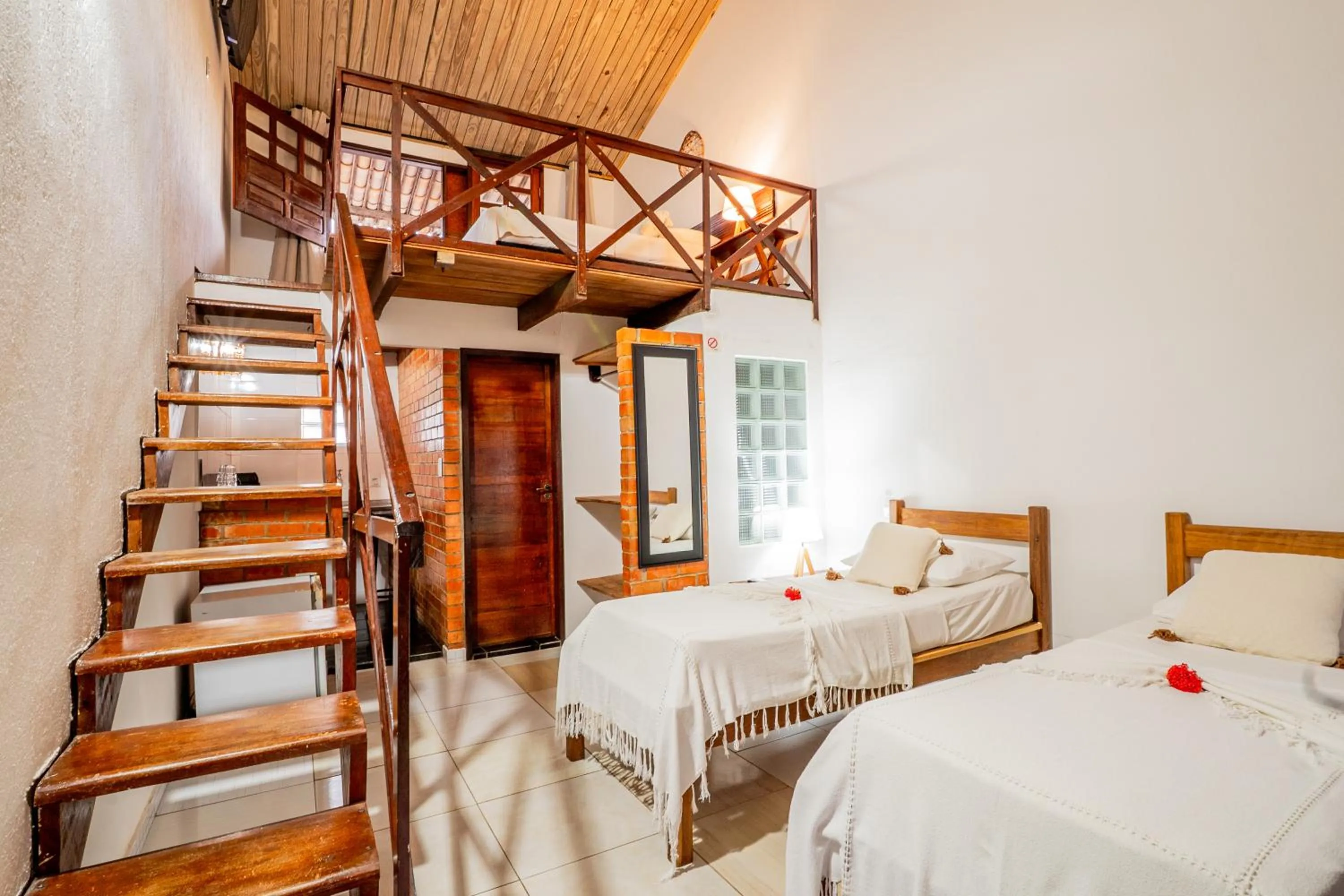 Photo of the whole room, Bed in Pousada Bicho Preguiça