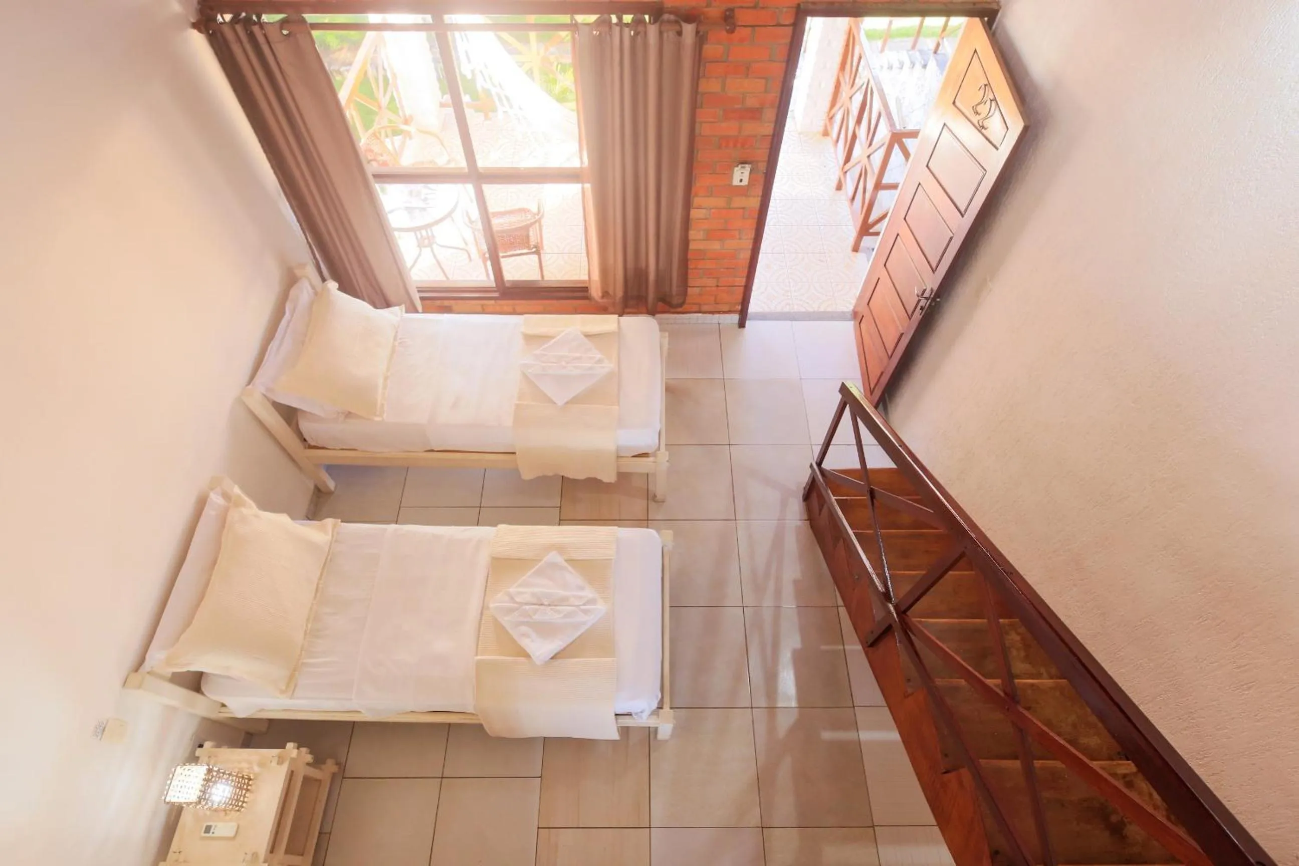 Bed in Pousada Bicho Preguiça