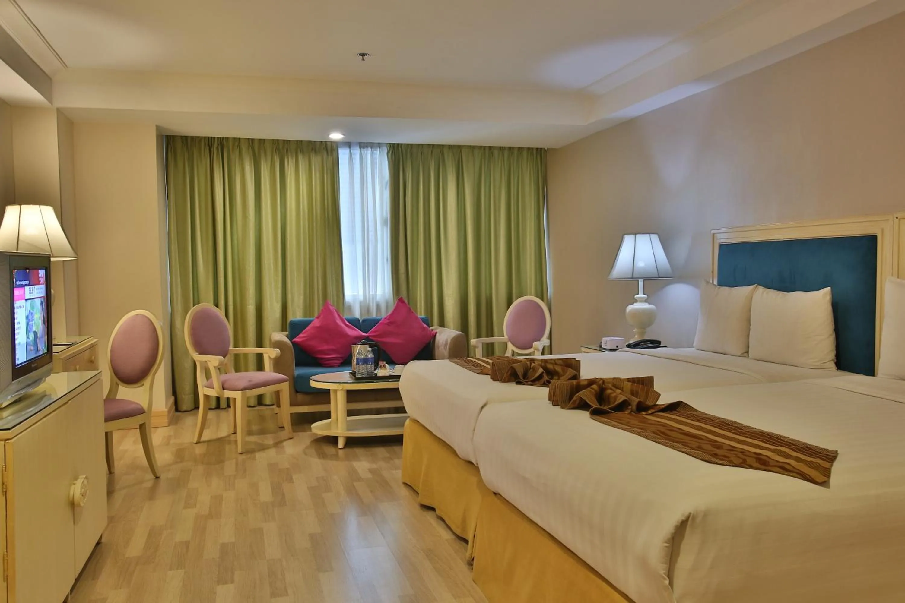 Photo of the whole room, Bed in Crown Regency Hotel & Towers