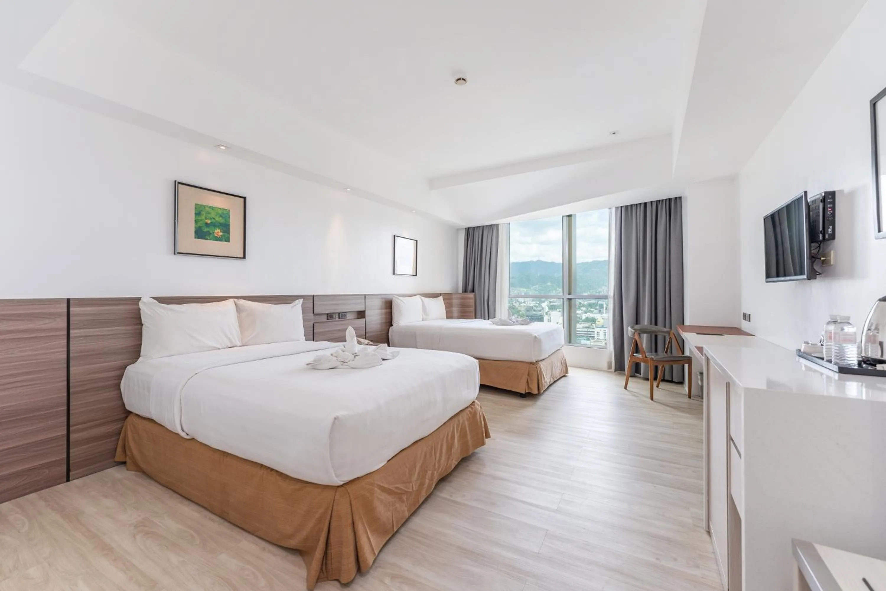 Bed in Crown Regency Hotel & Towers