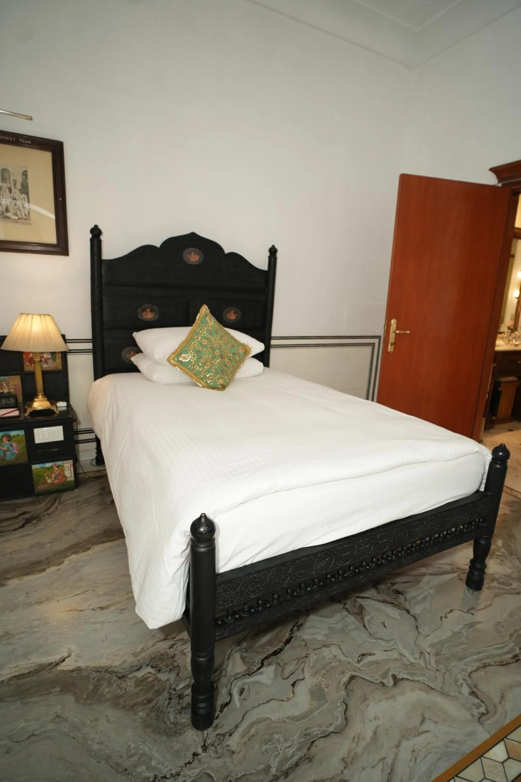 Bed in The Raj Palace (Small Luxury Hotels of the World)