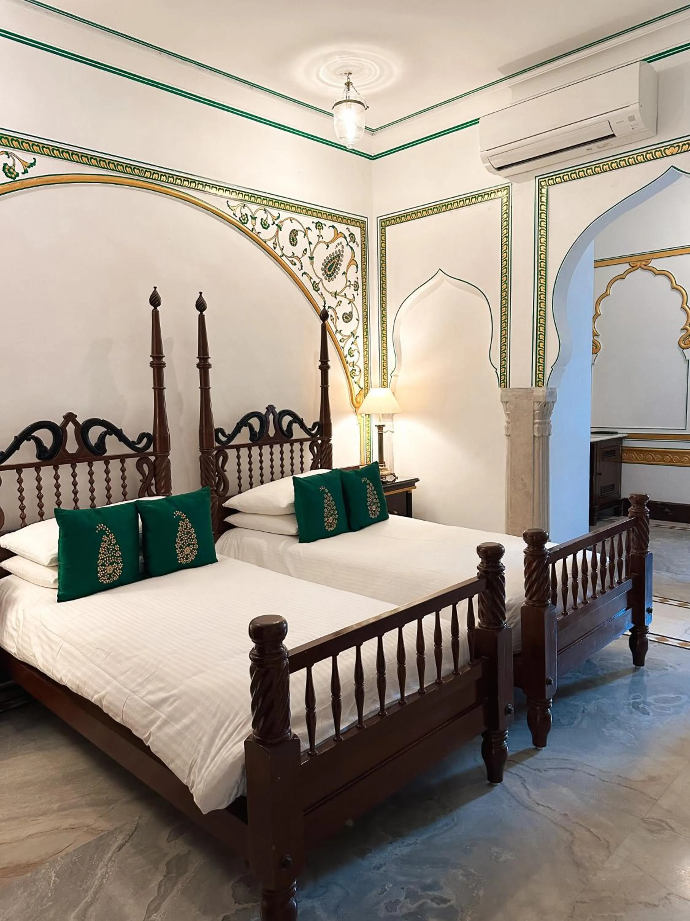 Bed in The Raj Palace (Small Luxury Hotels of the World)