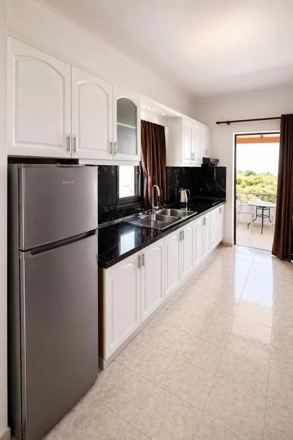 Kitchen or kitchenette in Vila Bilali