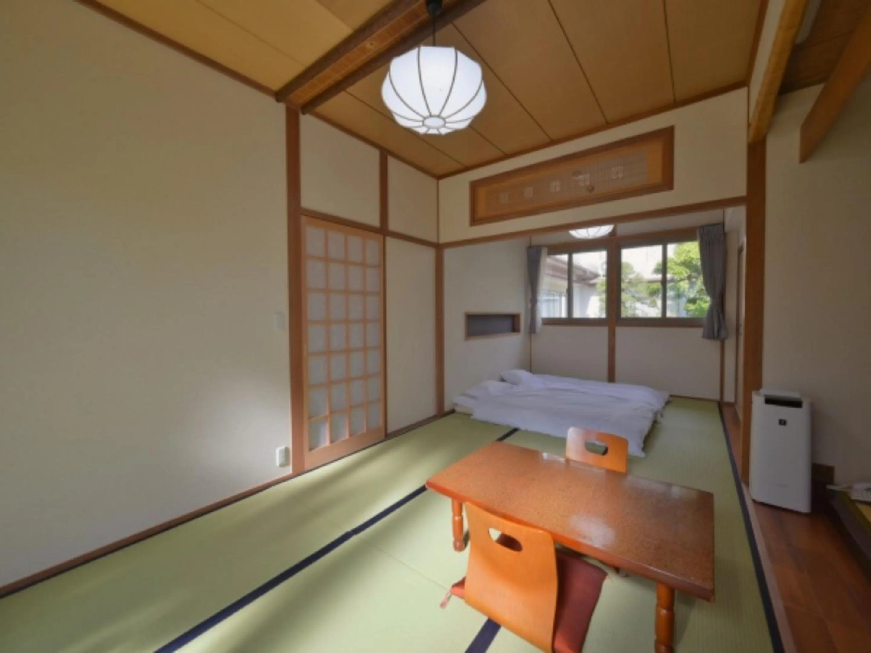 Bed in Wakariki Ryokan