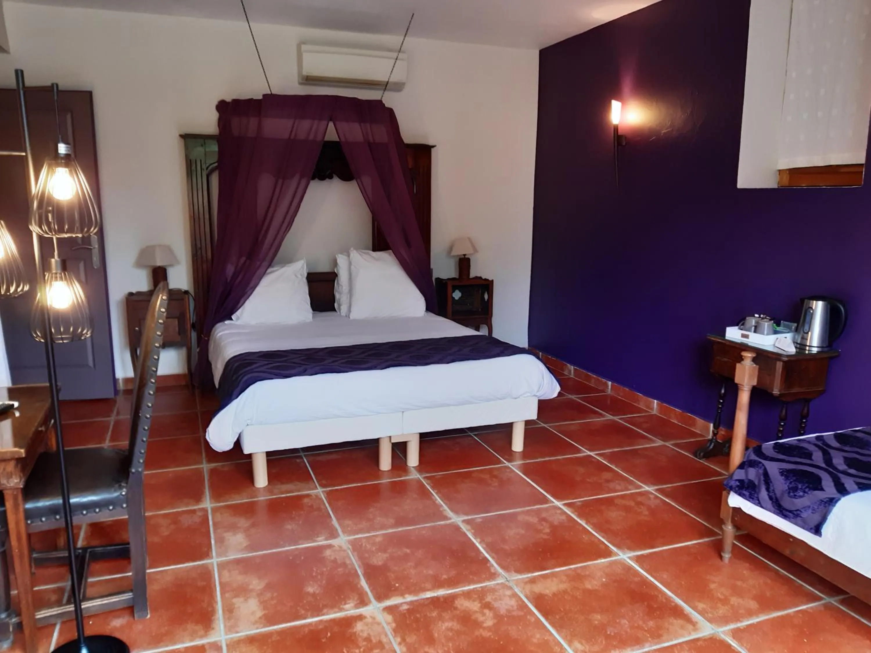 Photo of the whole room, Bed in Logis Domaine de Peyrolade