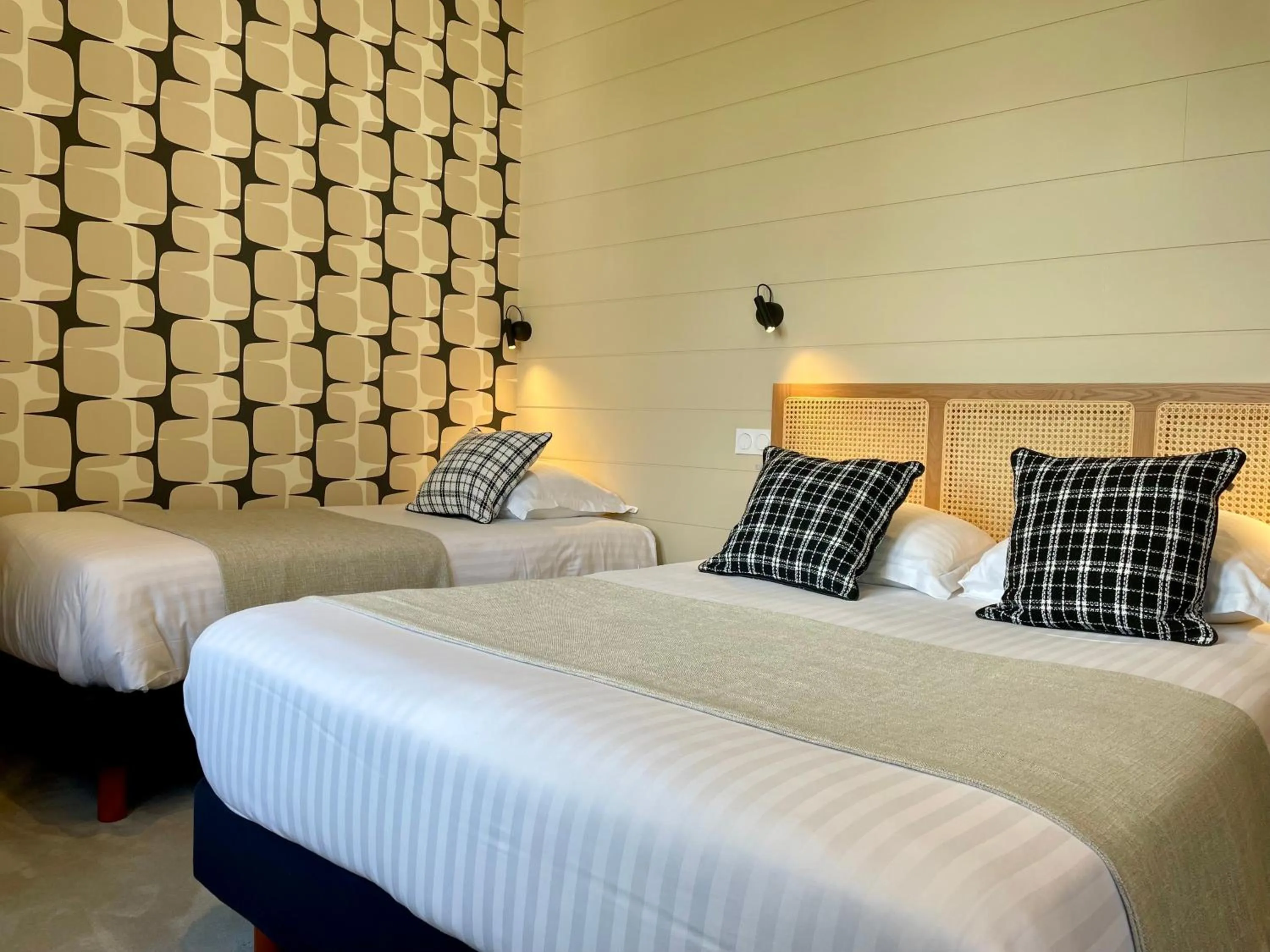 Bed in Hôtel Les Costans, The Originals Relais