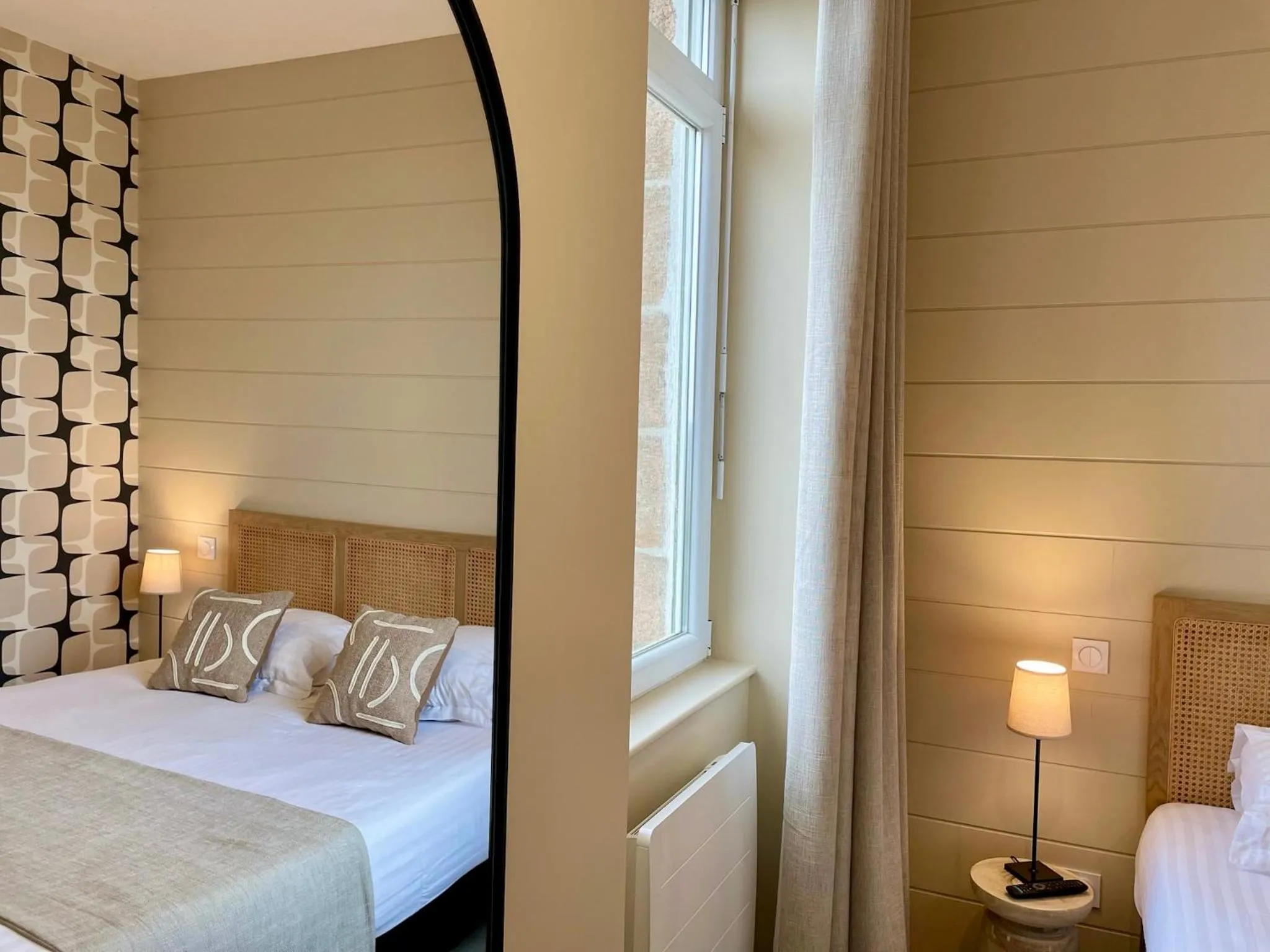 Bed in Hôtel Les Costans, The Originals Relais