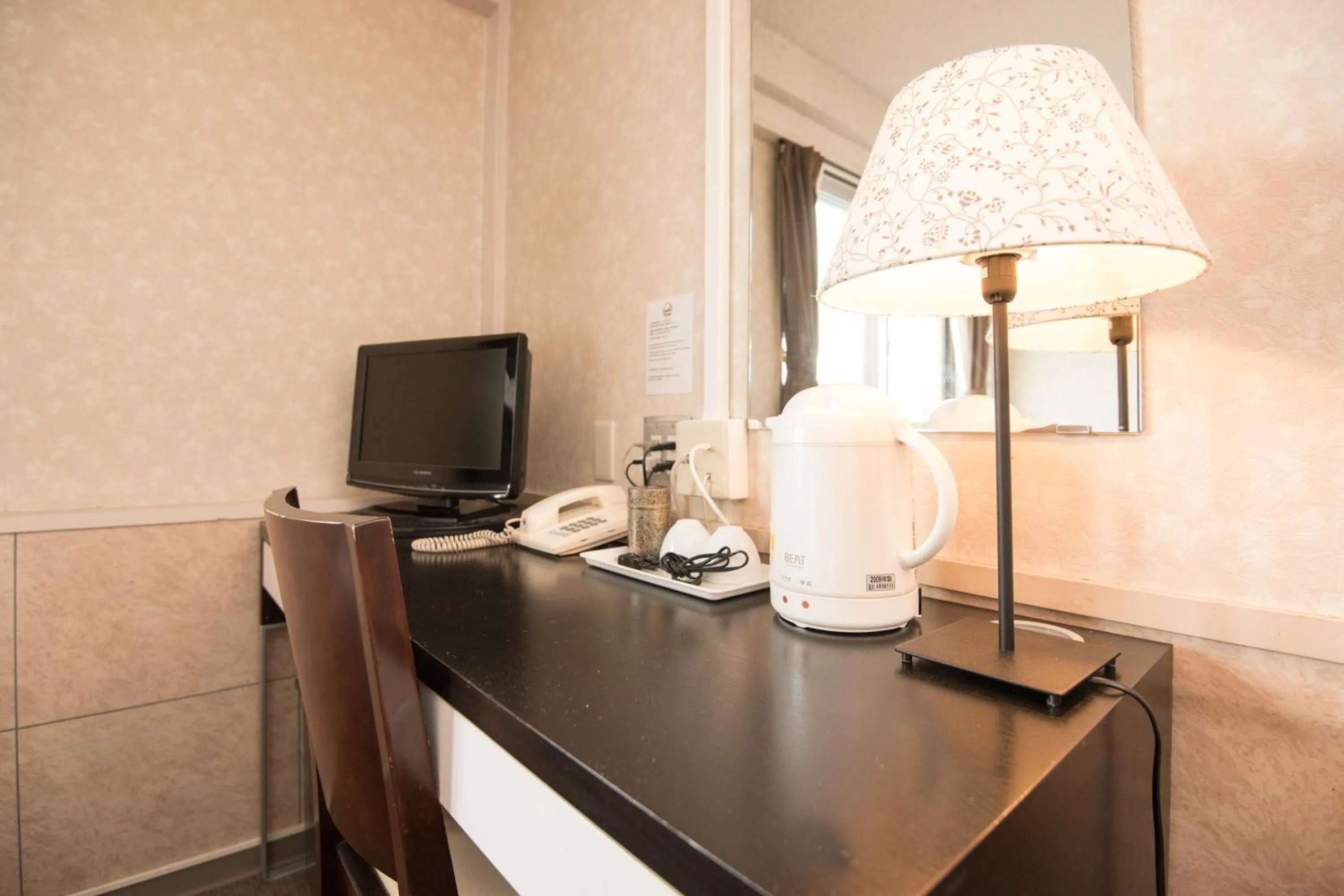 Bedroom in Kyoto Travellers Inn