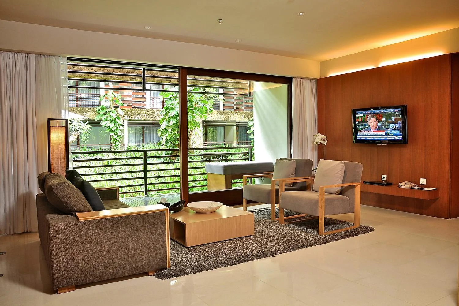 Communal lounge/ TV room in THE HAVEN Bali Seminyak
