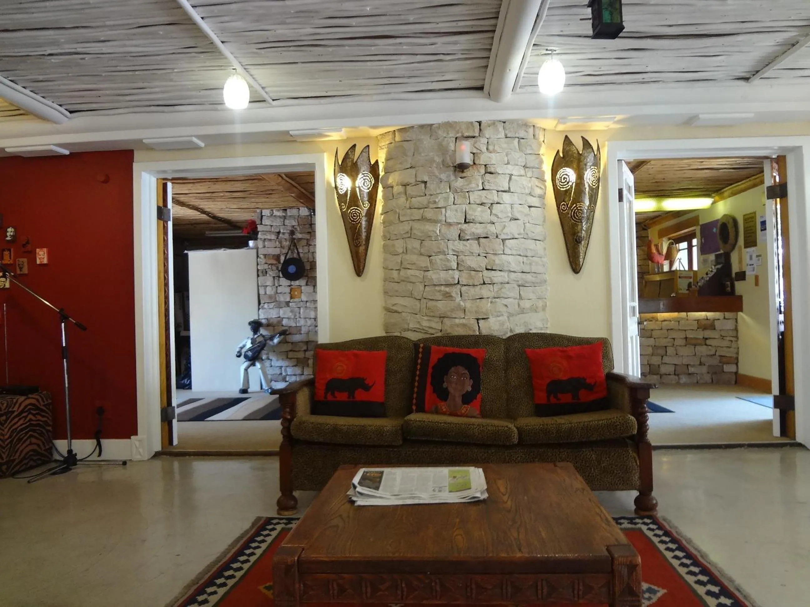 Communal lounge/ TV room in iKhaya Lodge