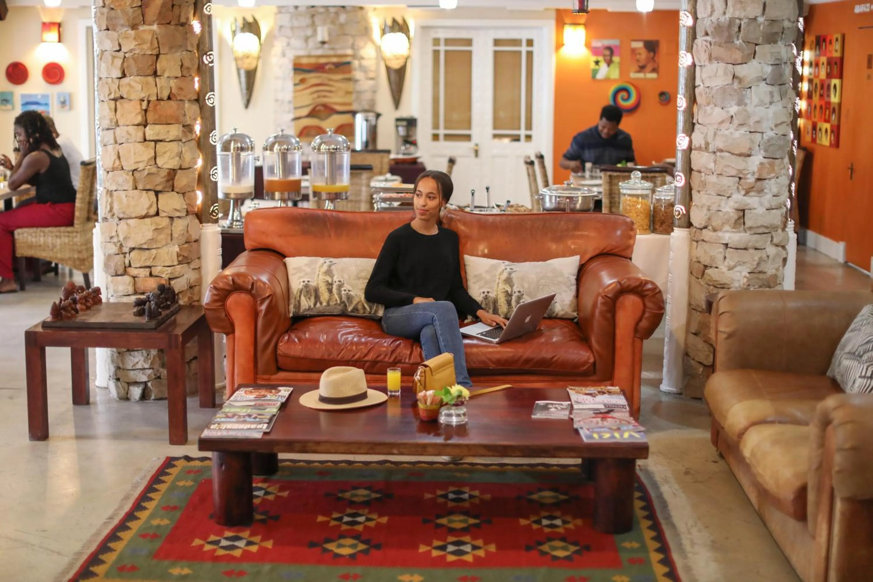 Communal lounge/ TV room in iKhaya Lodge