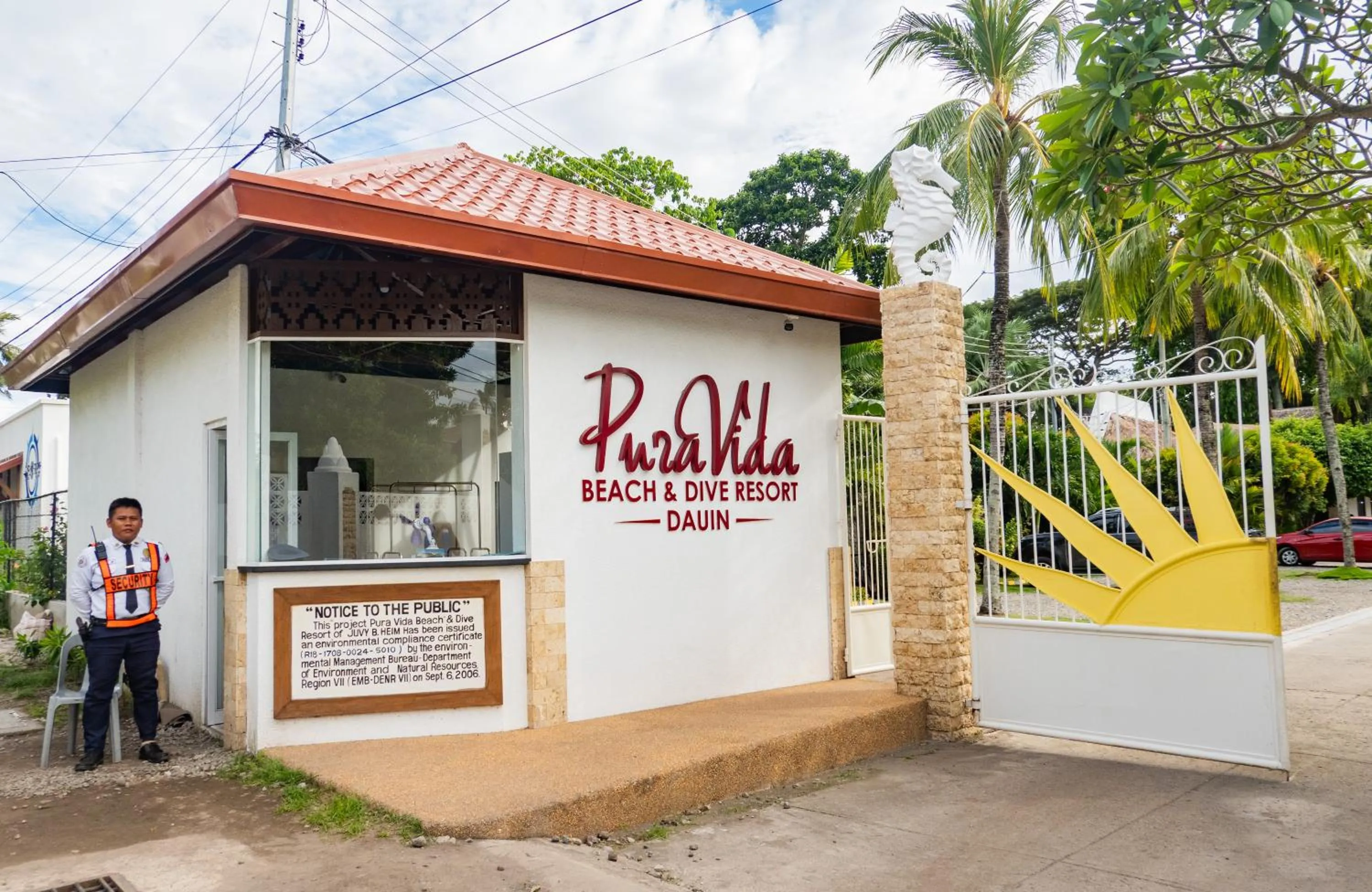 Property logo or sign in Pura Vida Beach & Dive Resort