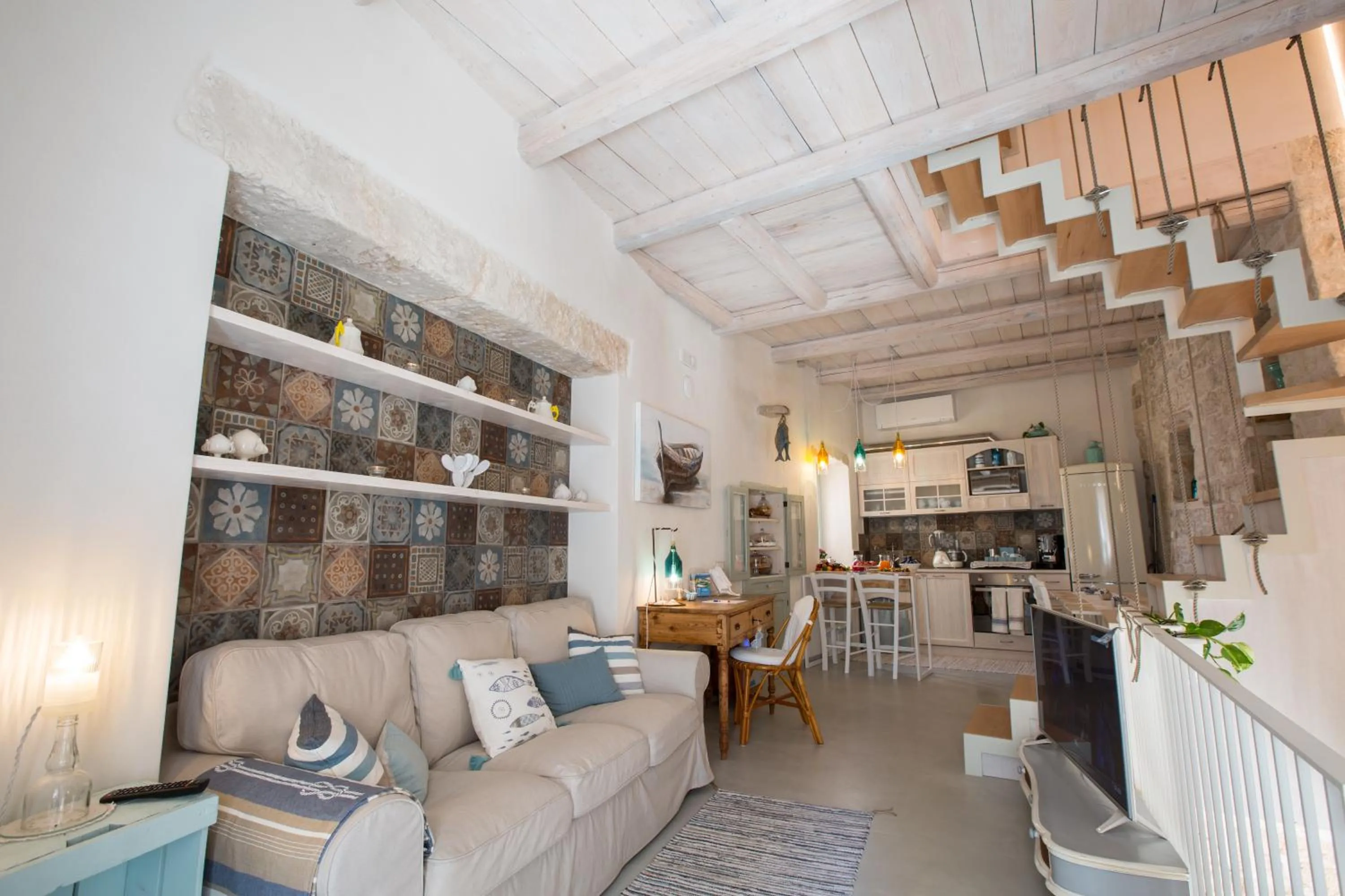 Communal lounge/ TV room in Trame - La Naca sul Porto