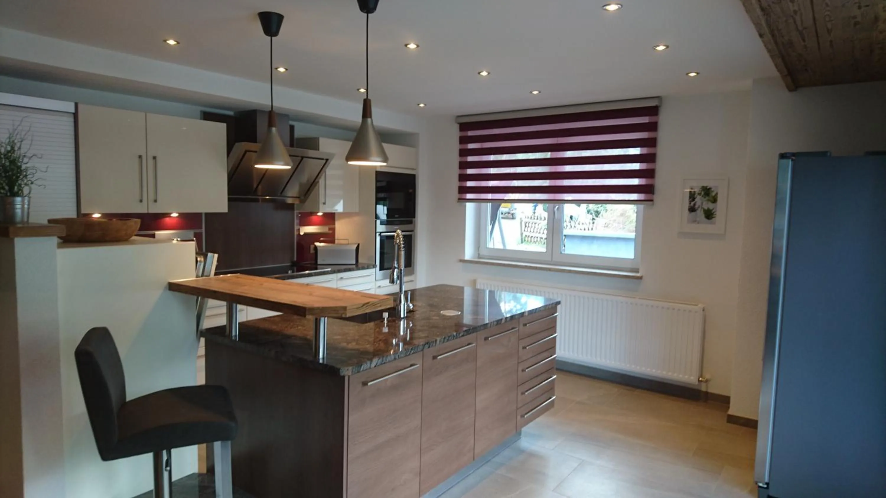Kitchen or kitchenette in Inn-Apartments