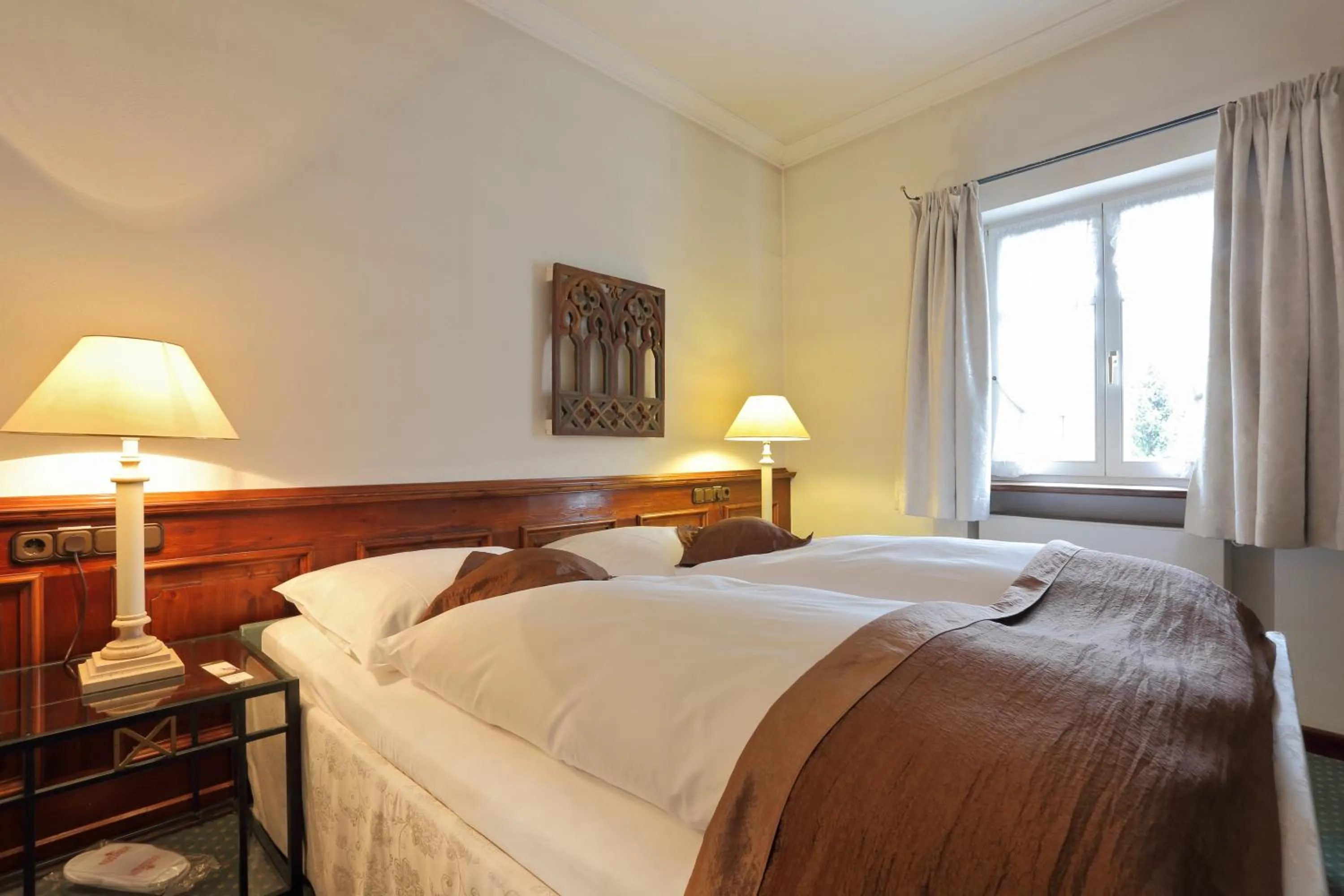 Bed in Romantik Hotel Zur Schwane