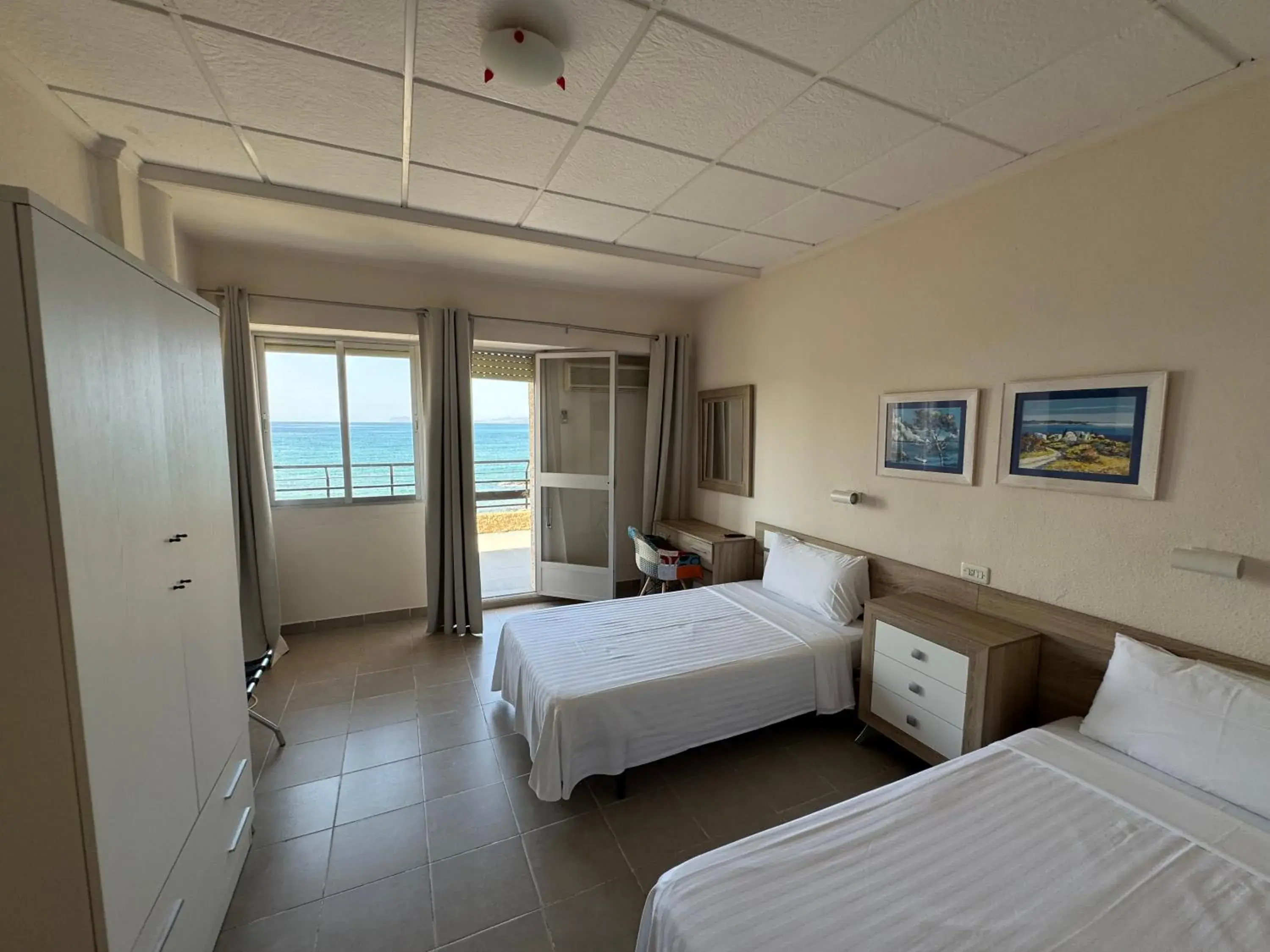 Twin Room with Balcony and Sea View in Bahía - 30º hotels Twin Room with Balcony and Sea View in Bahía - 30º hotels