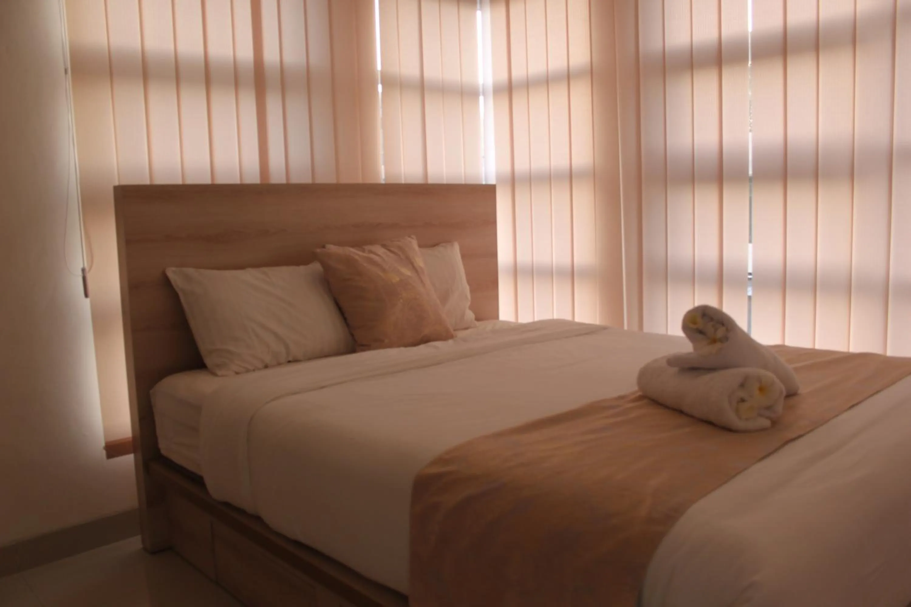 Bed in Wika Bali Beach House