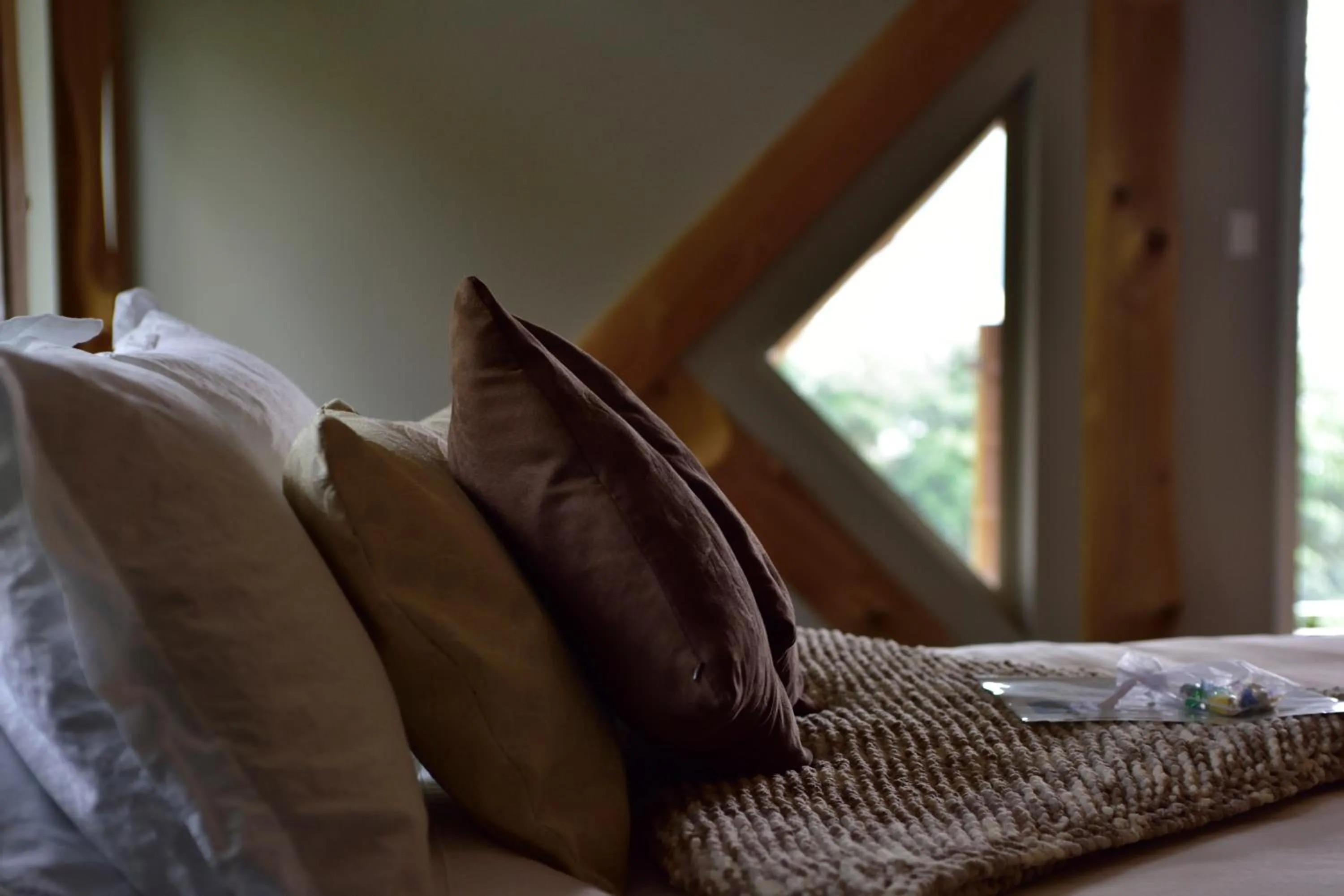 Bed in The Rockwell-Harrison Guest Lodge