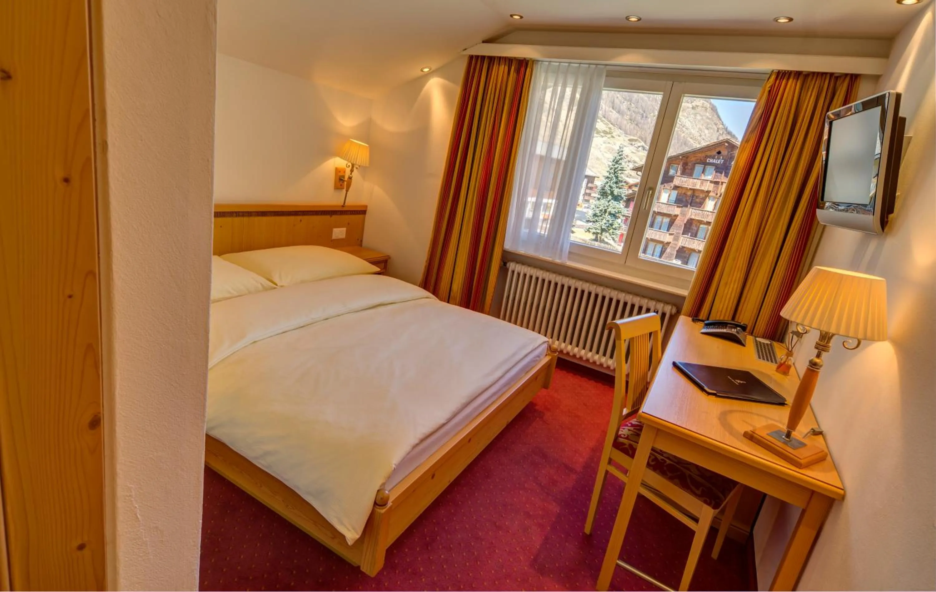 Bed in Hotel Excelsior