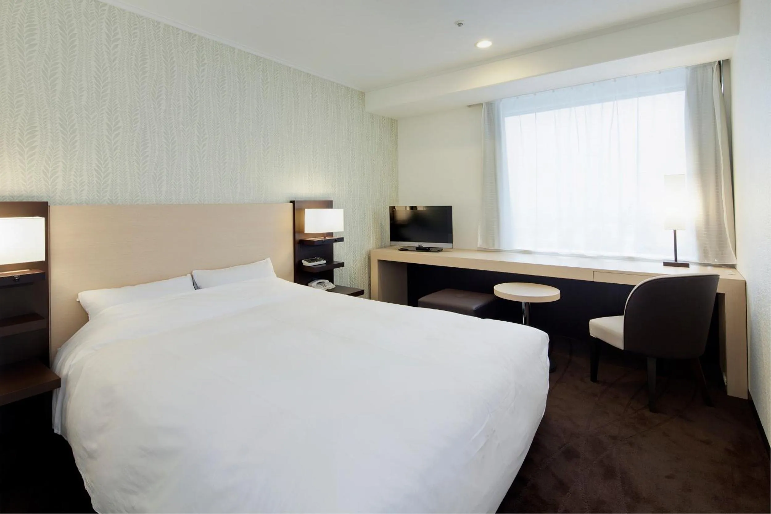 Bed in Hotel Granvia Osaka-JR Hotel Group