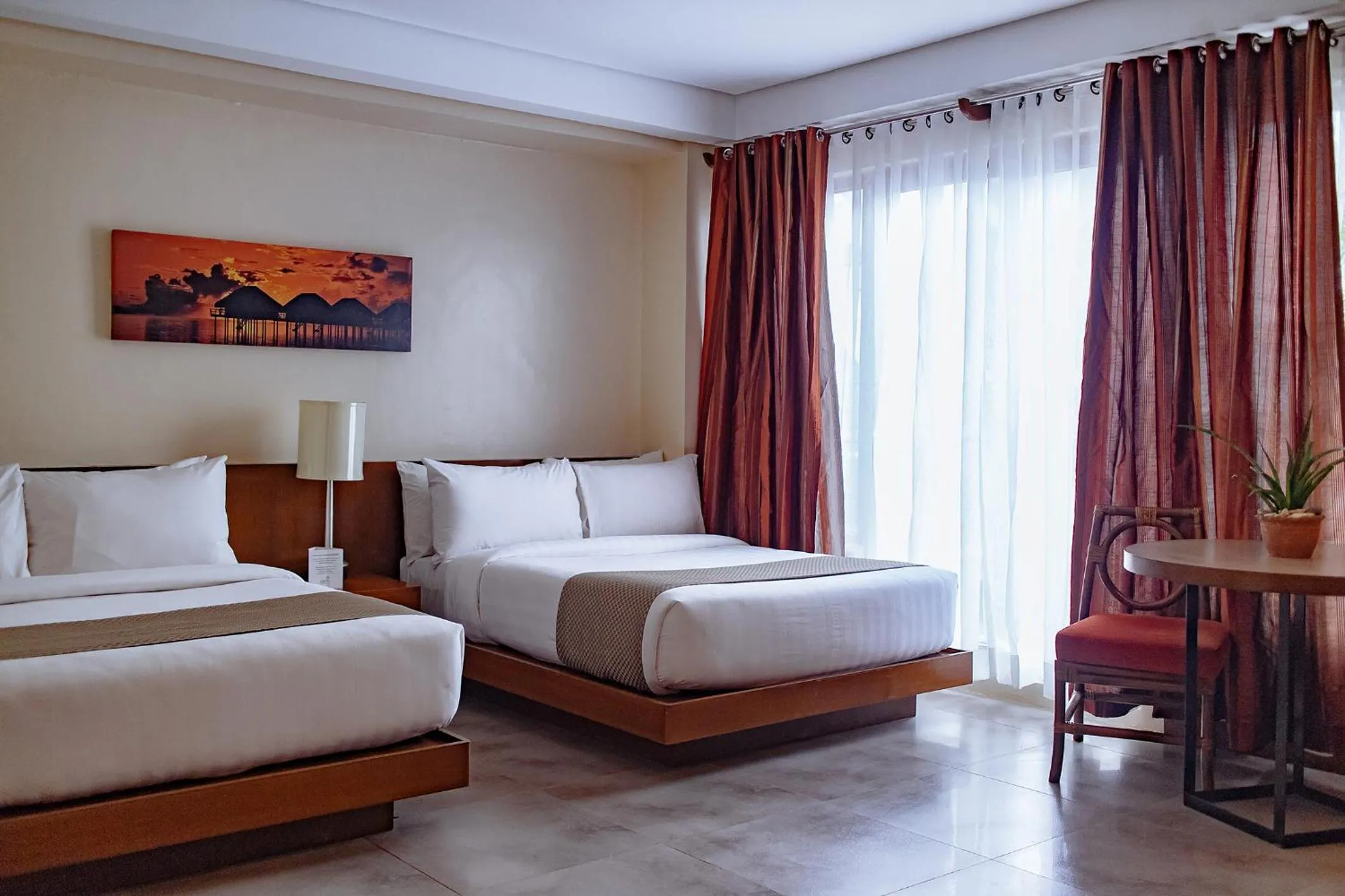 Bed in Crown Regency Beach Resort