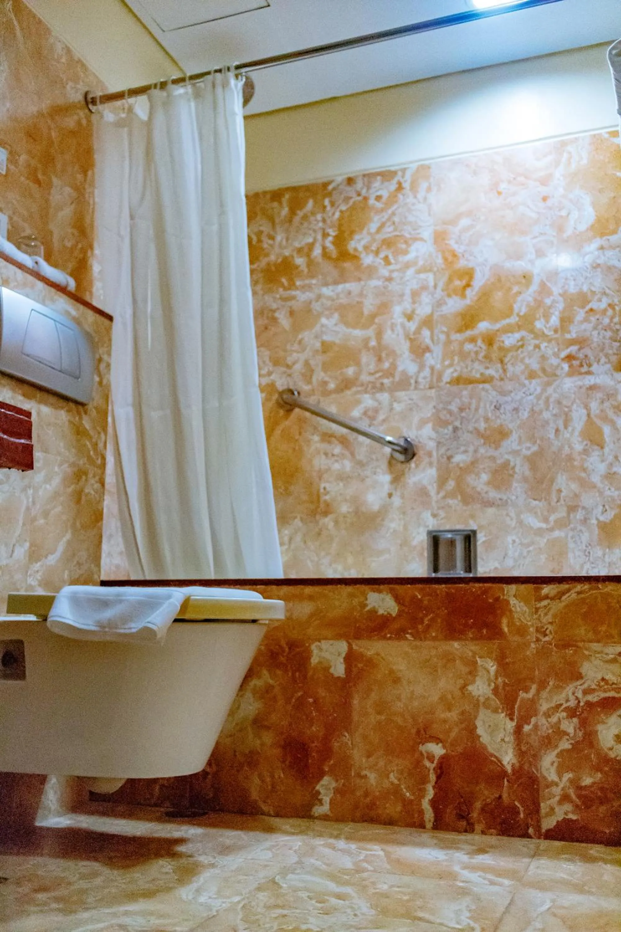 Shower in Crown Regency Beach Resort