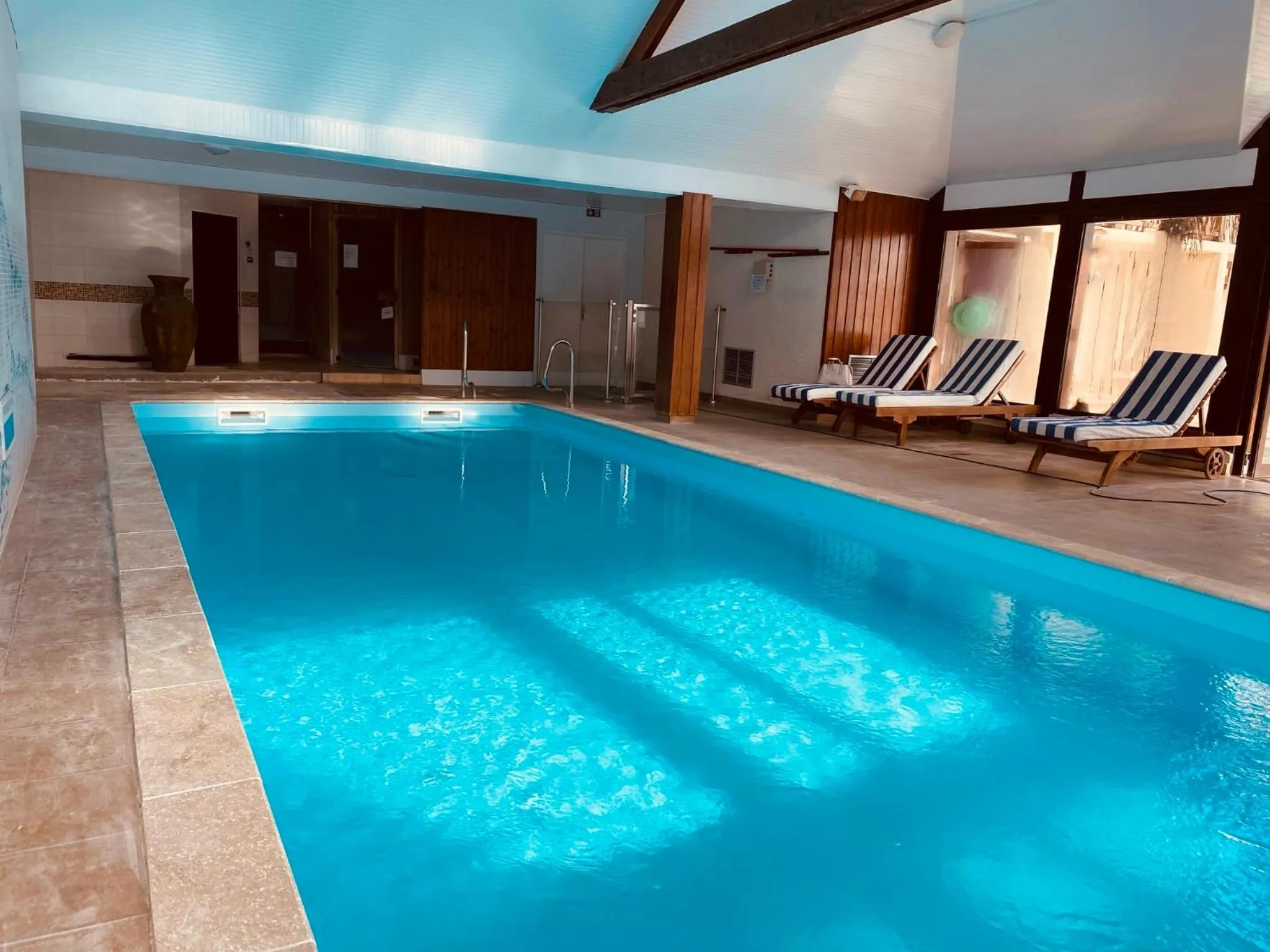 Swimming pool in Logis Le Clos Deauville Saint Gatien