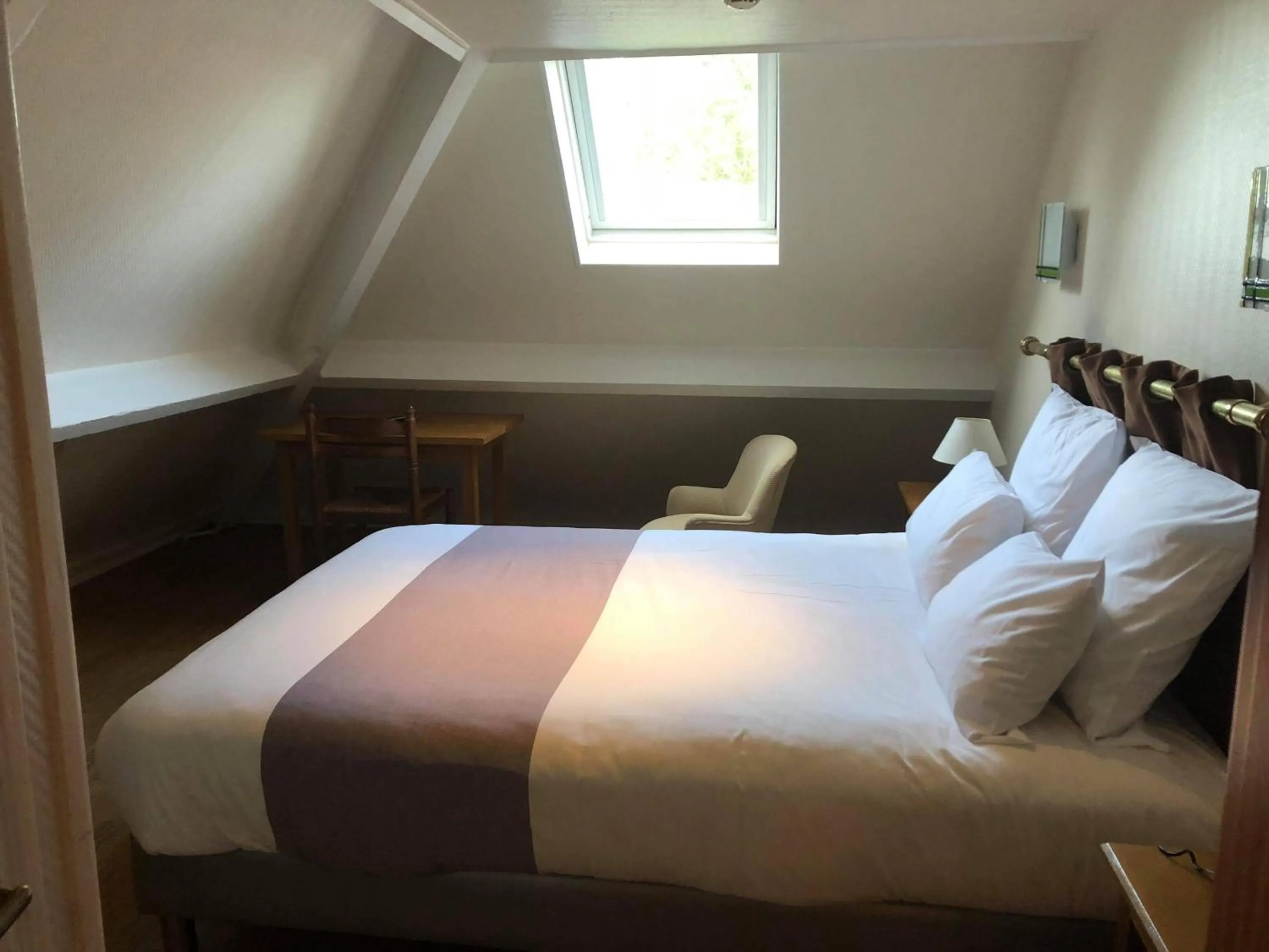 Bed in Logis Le Clos Deauville Saint Gatien