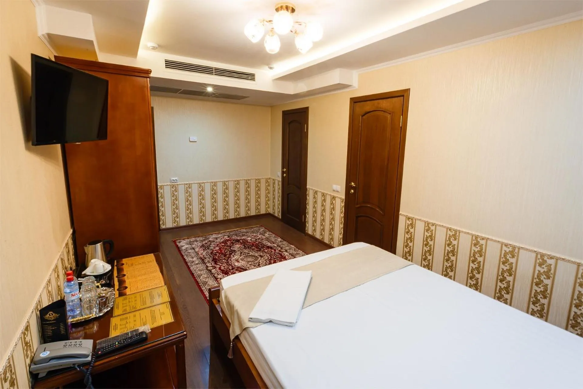 Bed in Salut Hotel Almaty