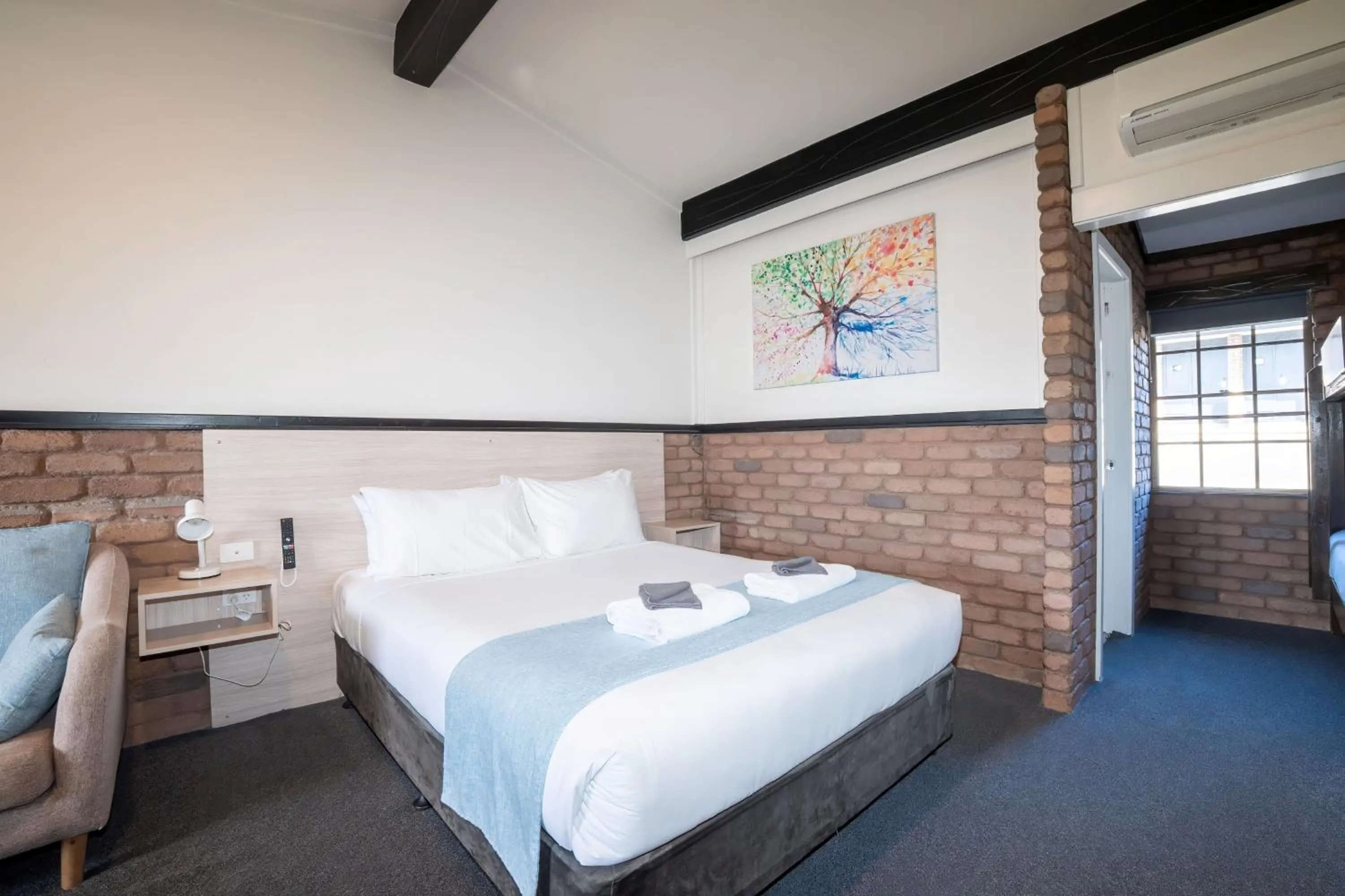 Bed in Olde Tudor Hotel