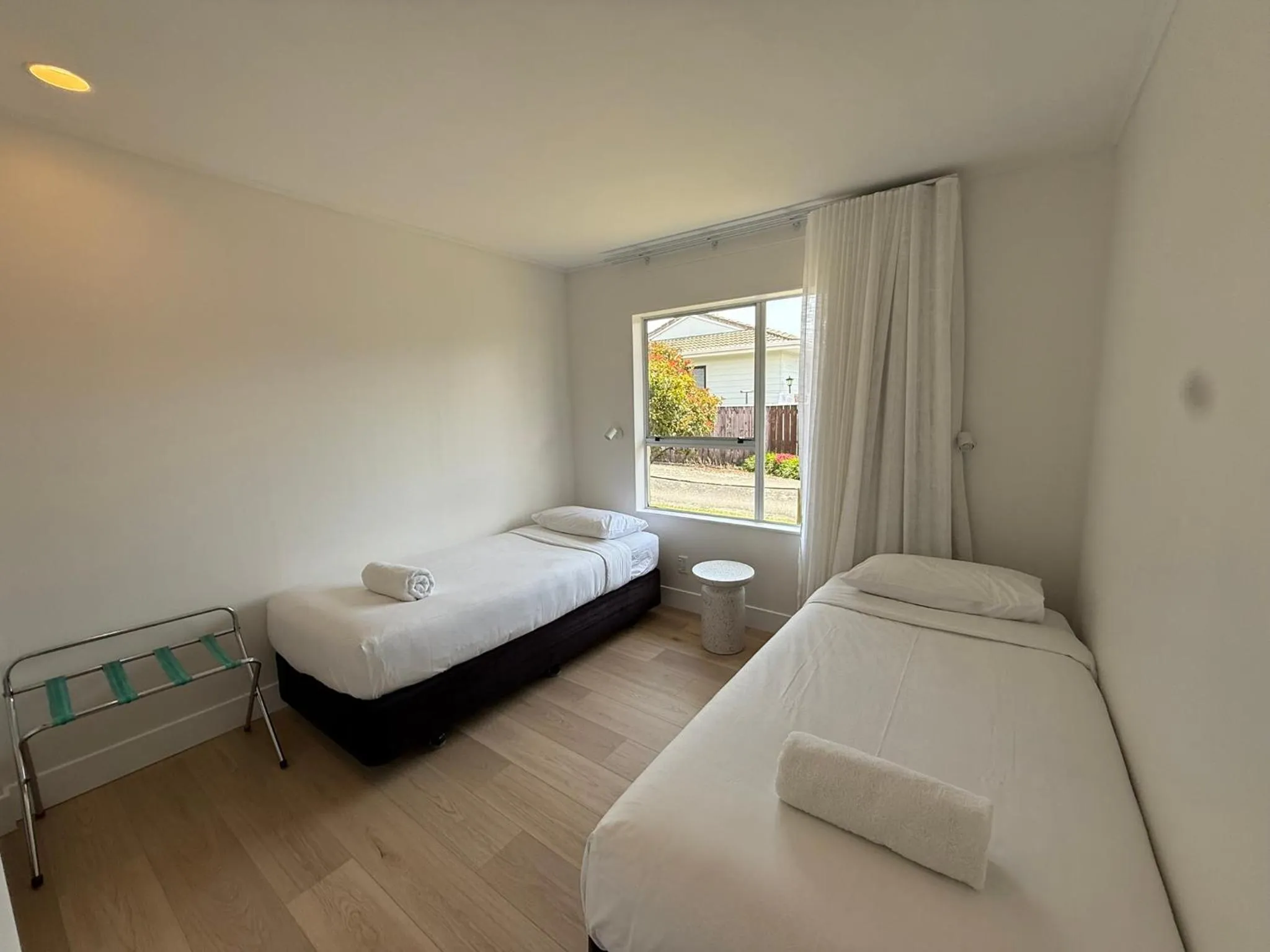 Bed in ASURE Fountain Resort Motel