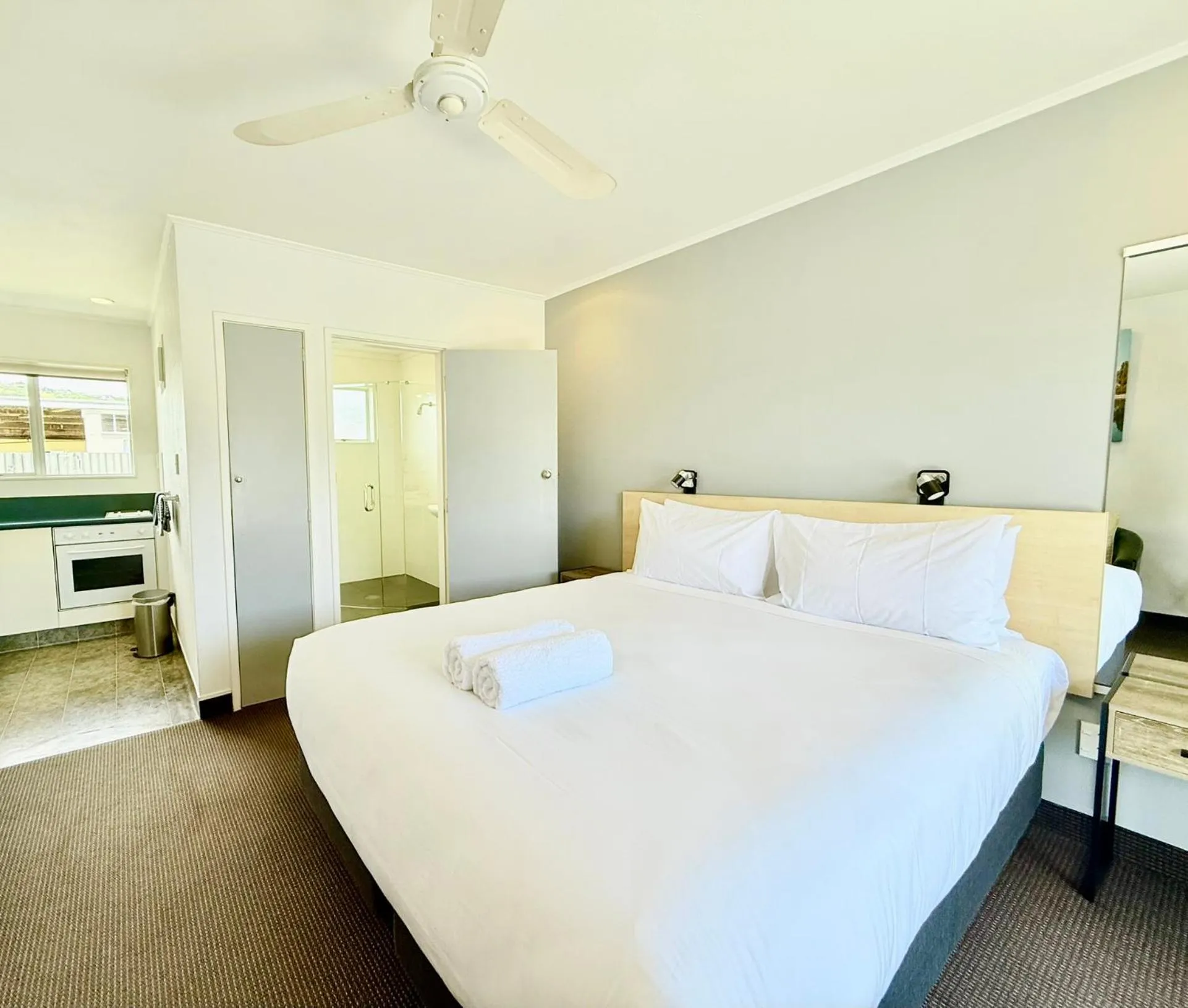 Bed in ASURE Fountain Resort Motel