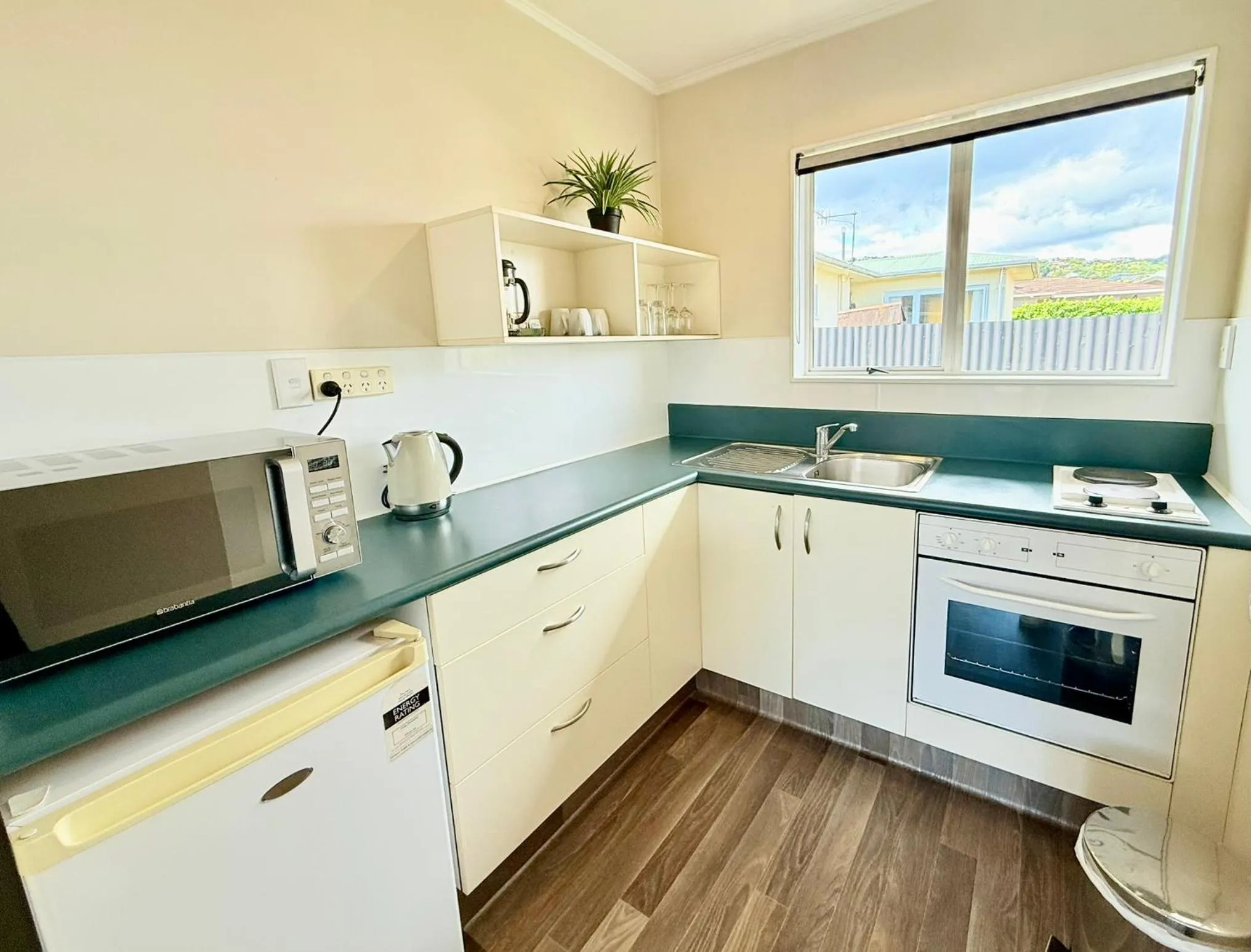 Kitchen or kitchenette in ASURE Fountain Resort Motel