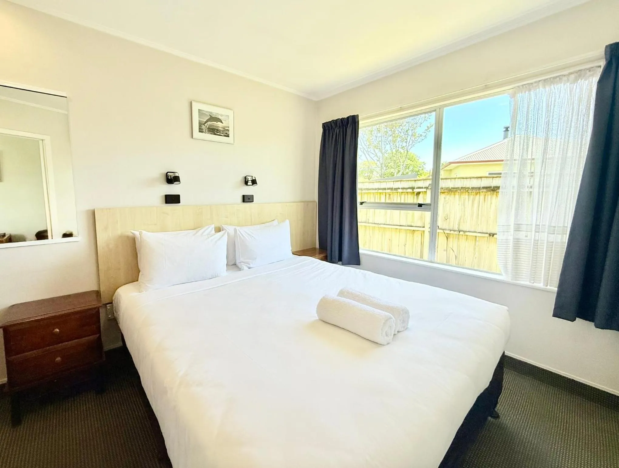 Bedroom, Bed in ASURE Fountain Resort Motel